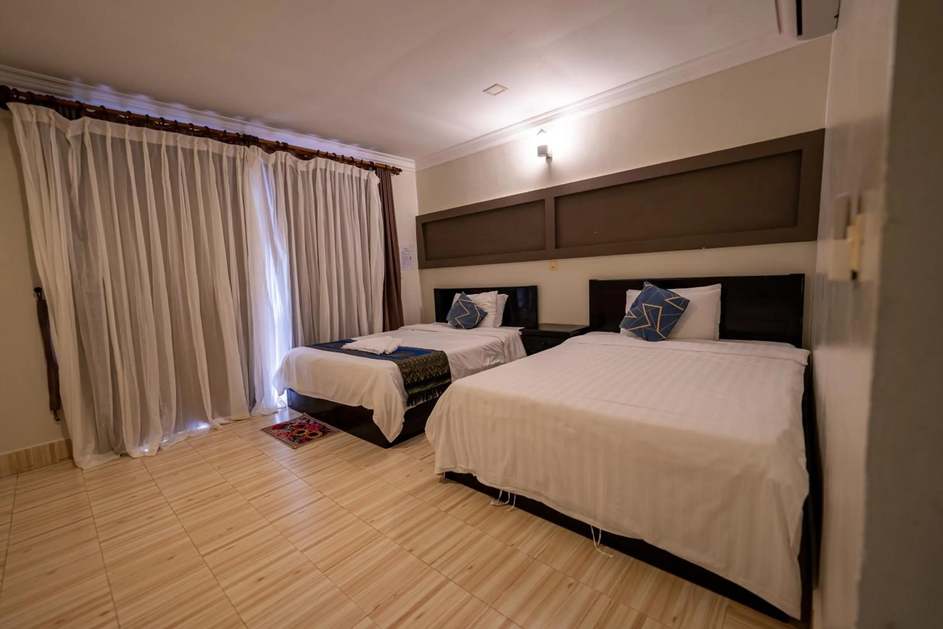 Bed in Hello Kampot Resort