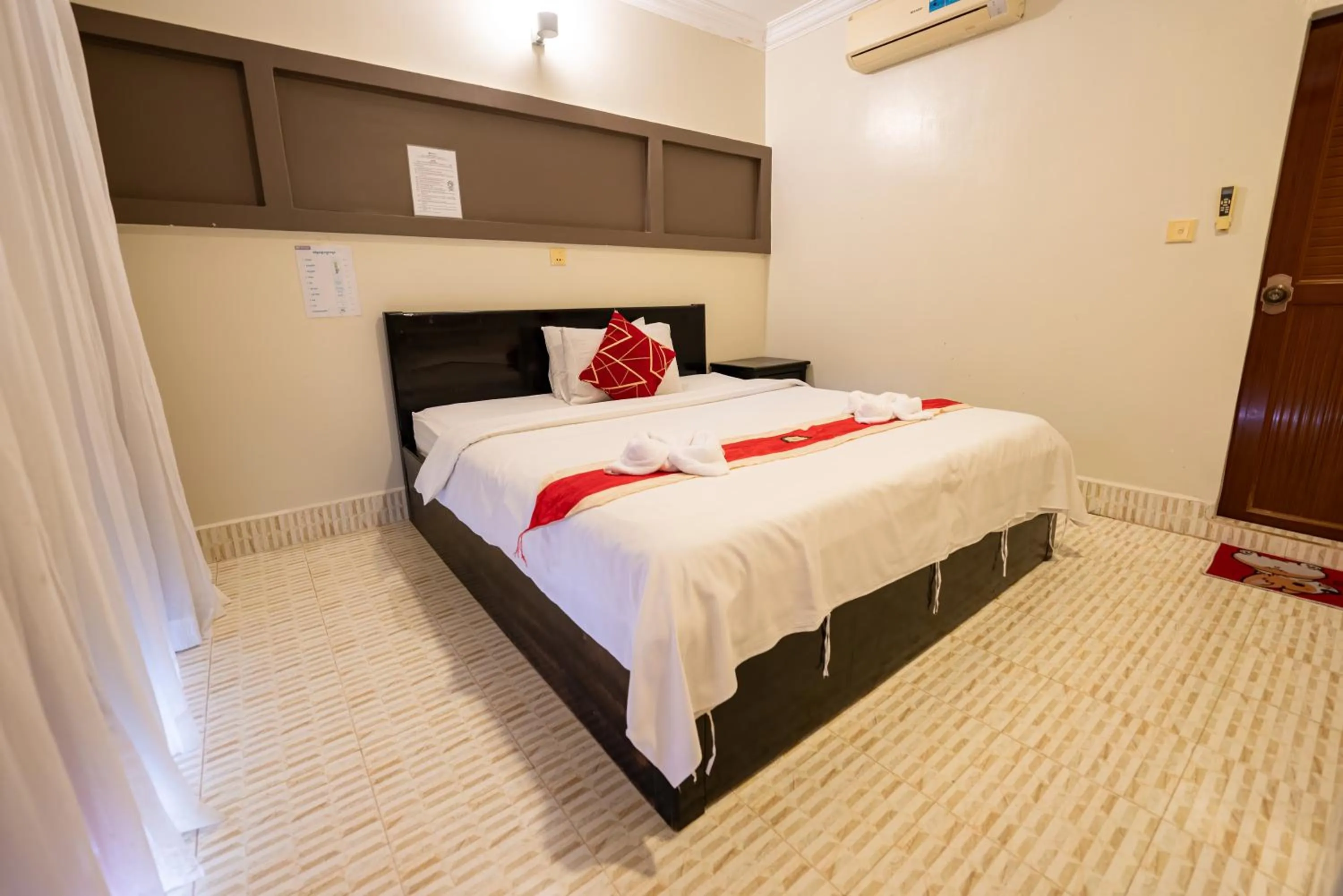 Bed in Hello Kampot Resort