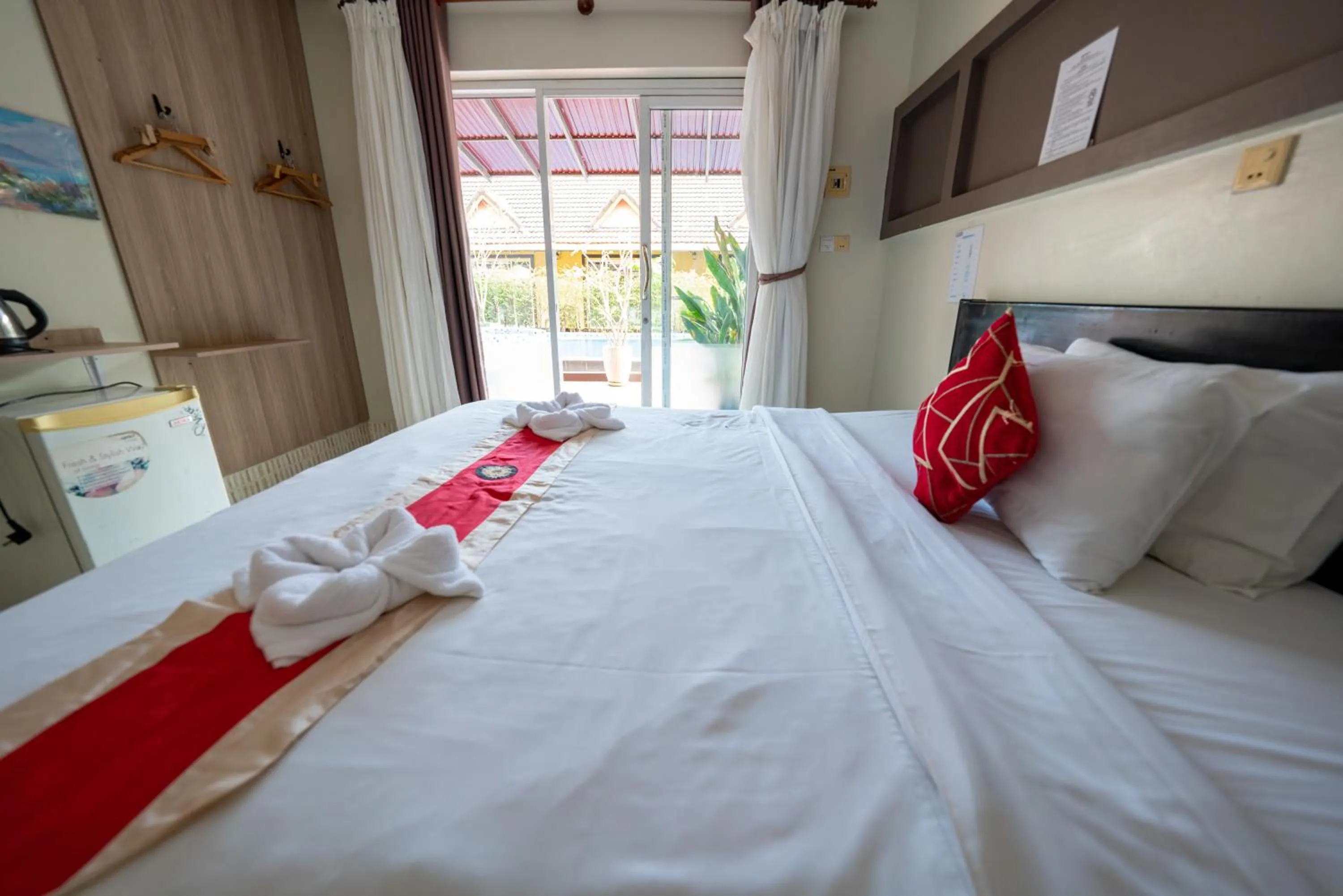 Bed in Hello Kampot Resort