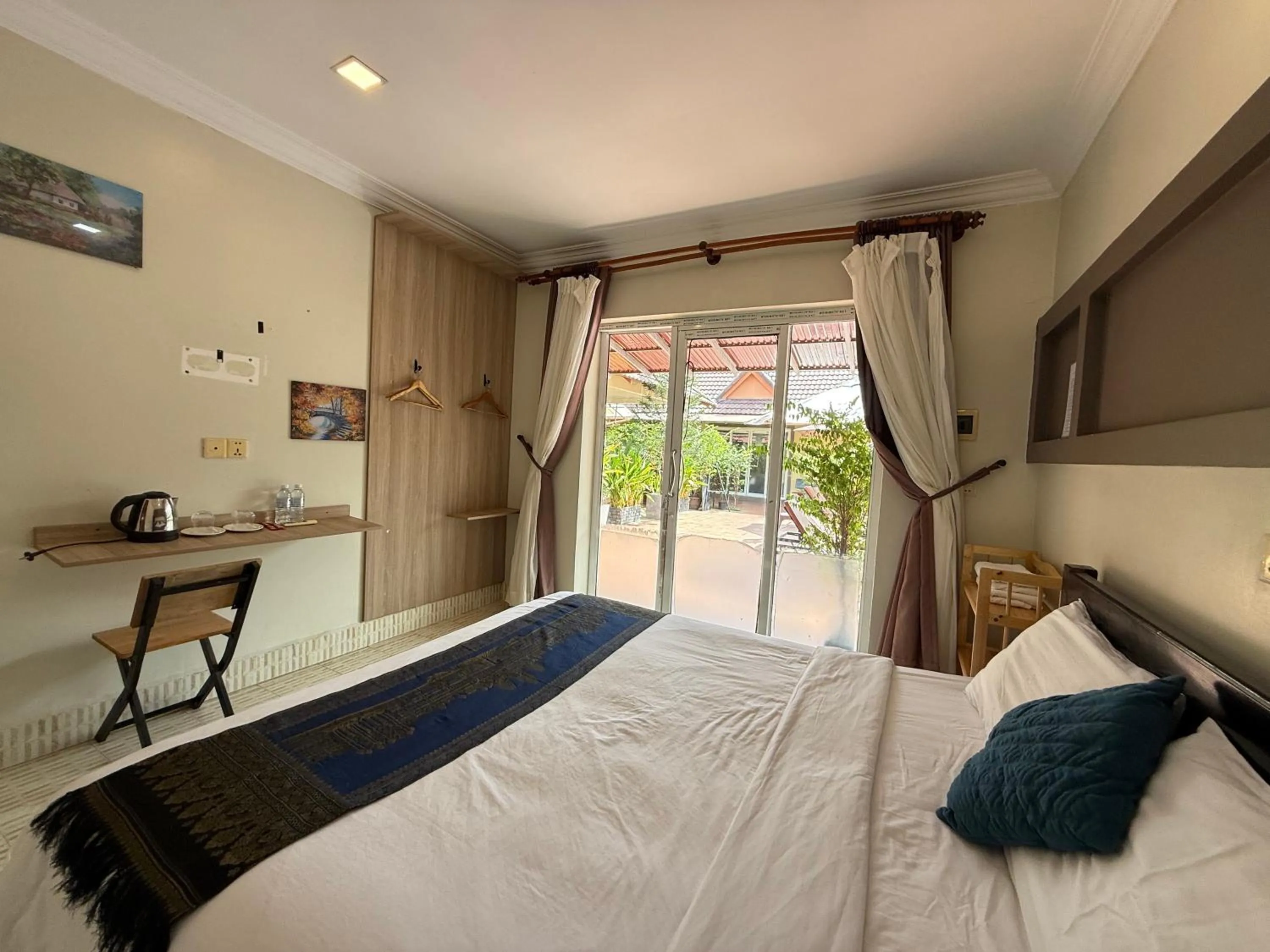 Bed in Hello Kampot Resort