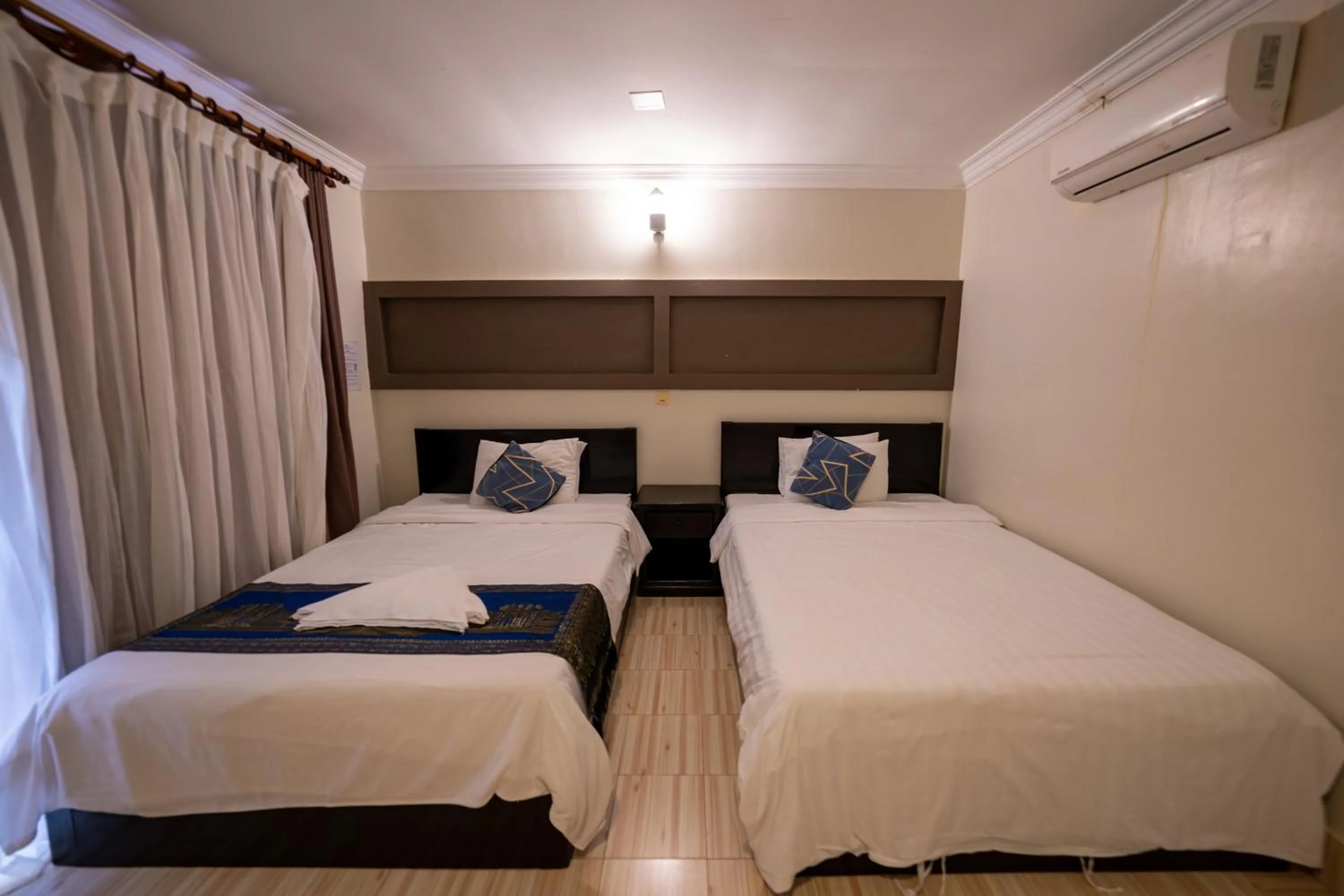 Bed in Hello Kampot Resort