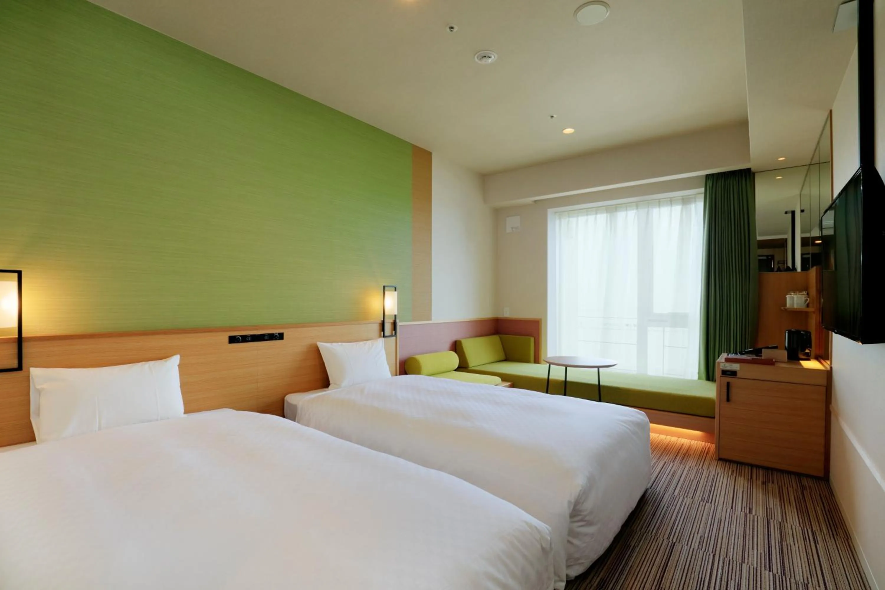 Photo of the whole room, Bed in THE SINGULARI HOTEL & SKYSPA at UNIVERSAL STUDIOS JAPAN