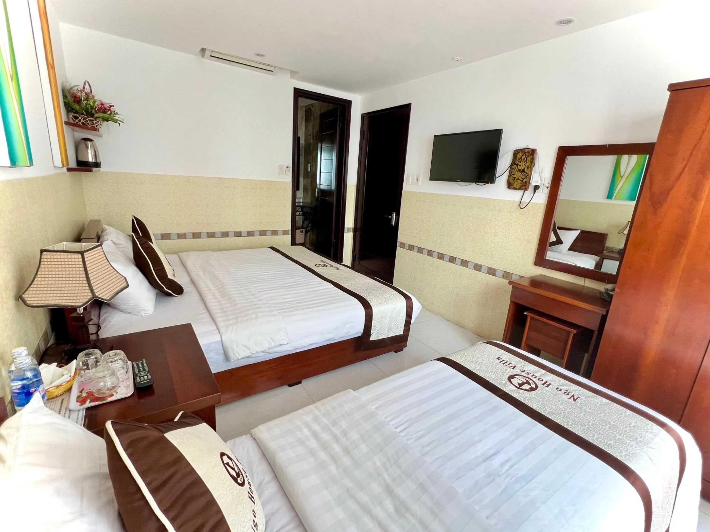Bed in Ngo House Villa