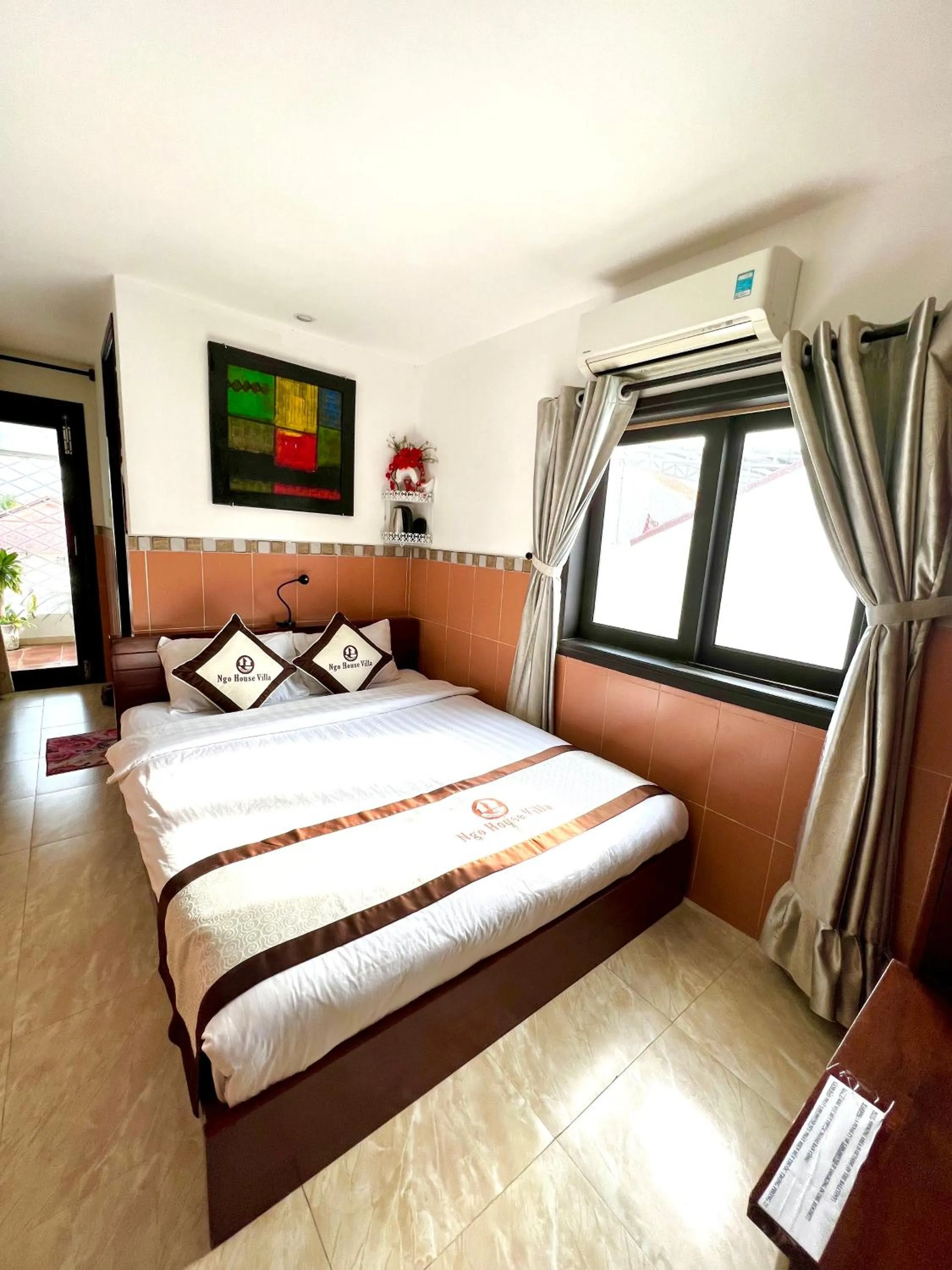 Bed in Ngo House Villa