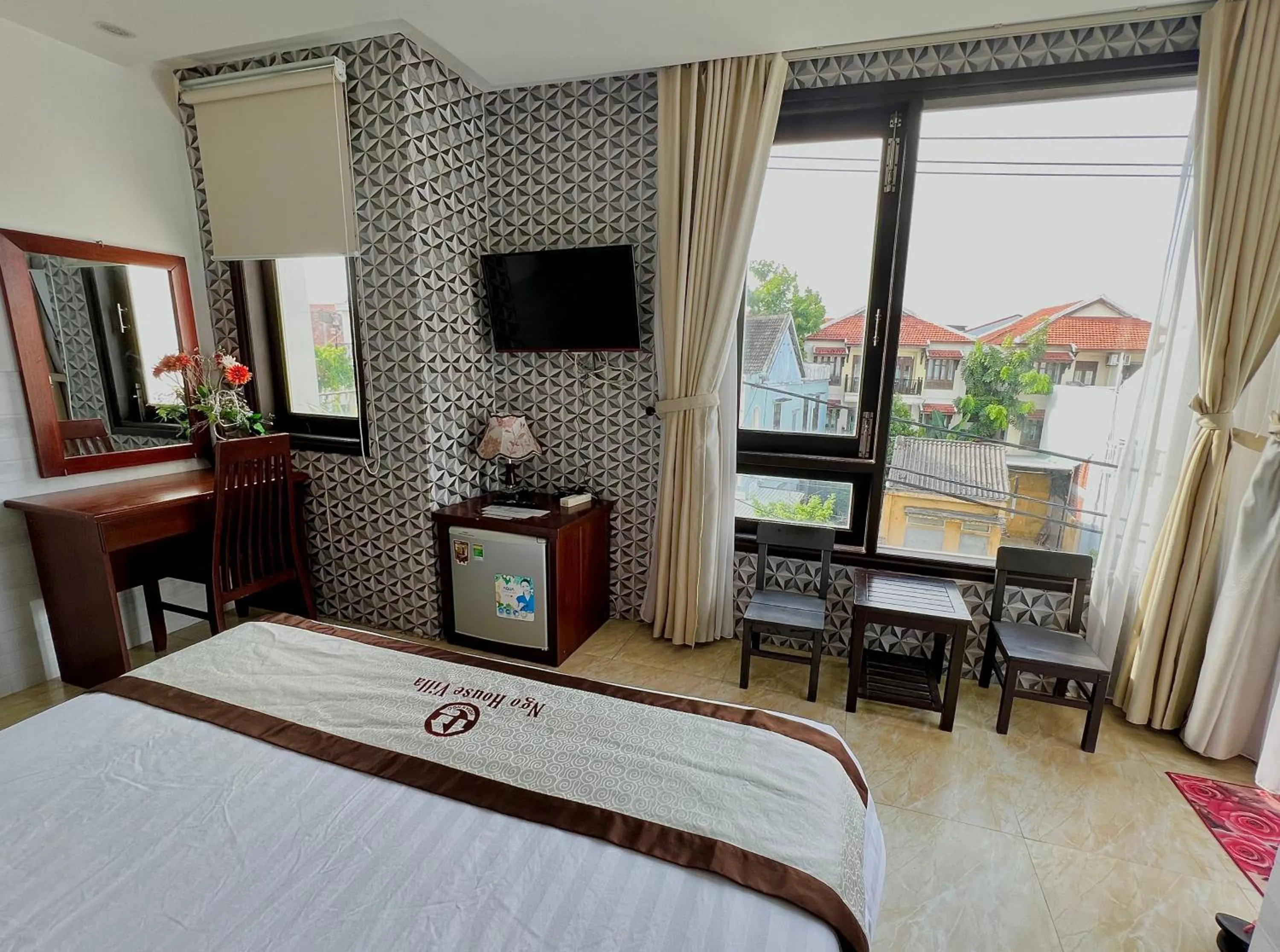 TV and multimedia, Bed in Ngo House Villa