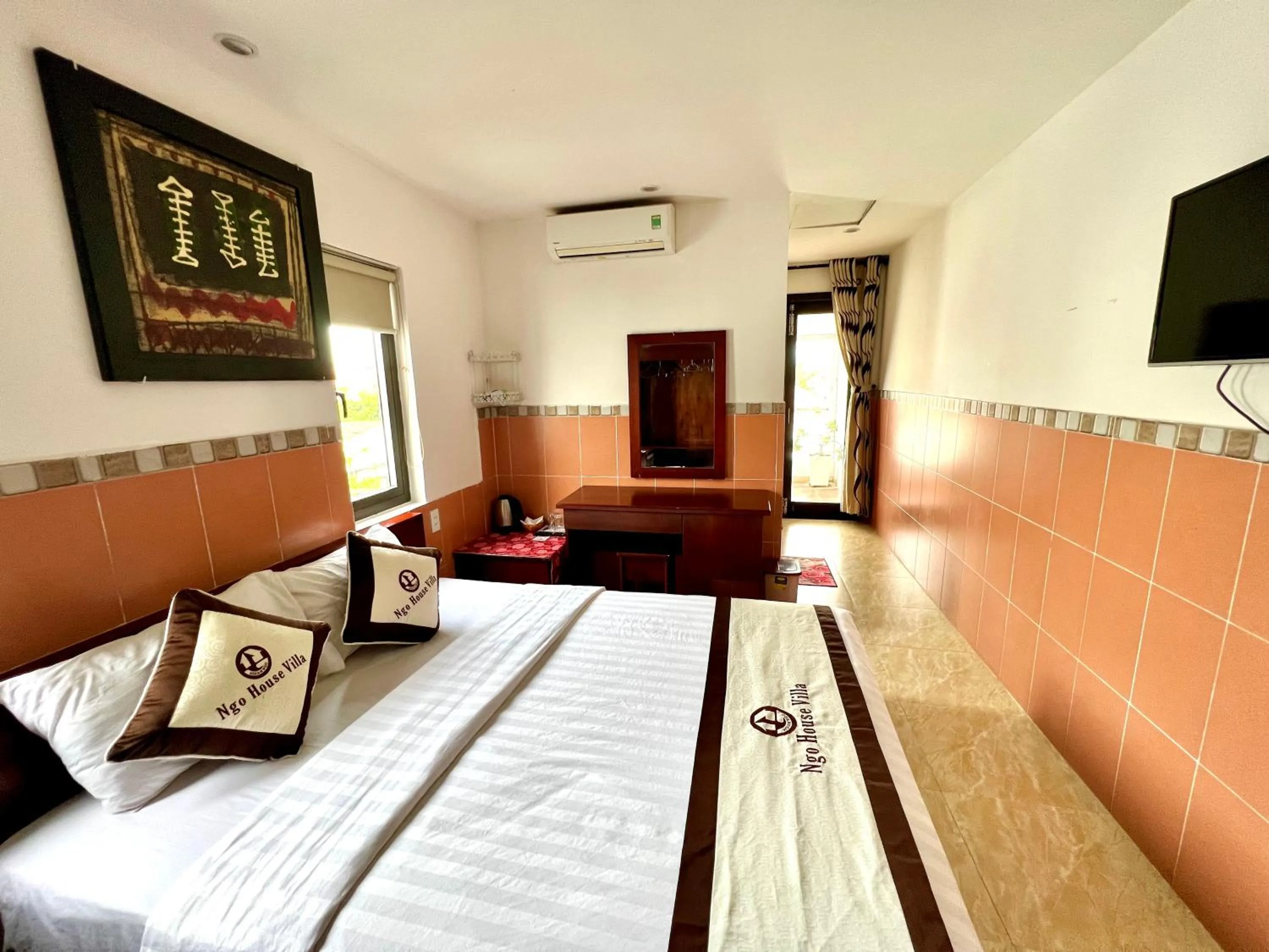 Bed in Ngo House Villa