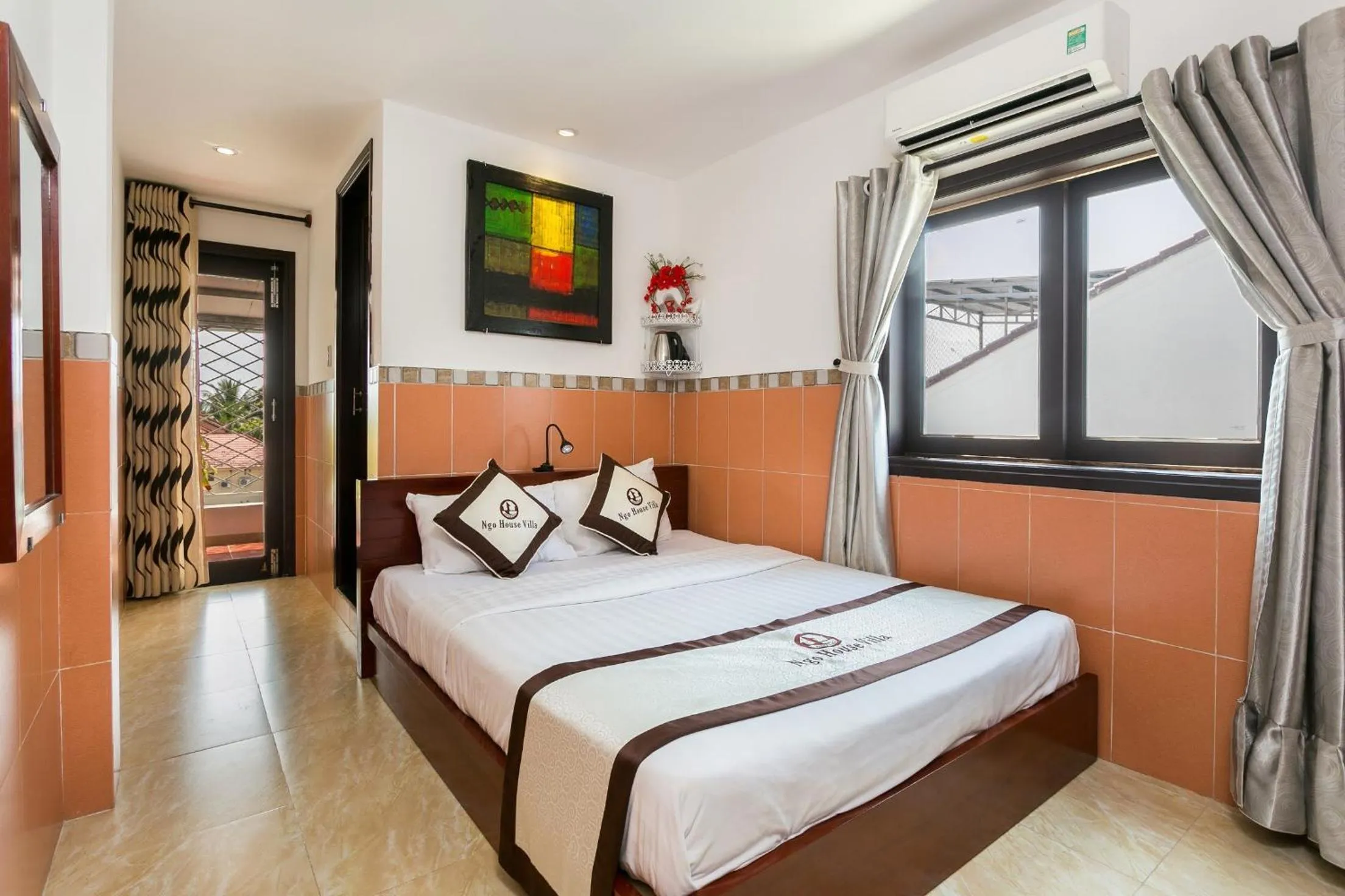 Bed in Ngo House Villa