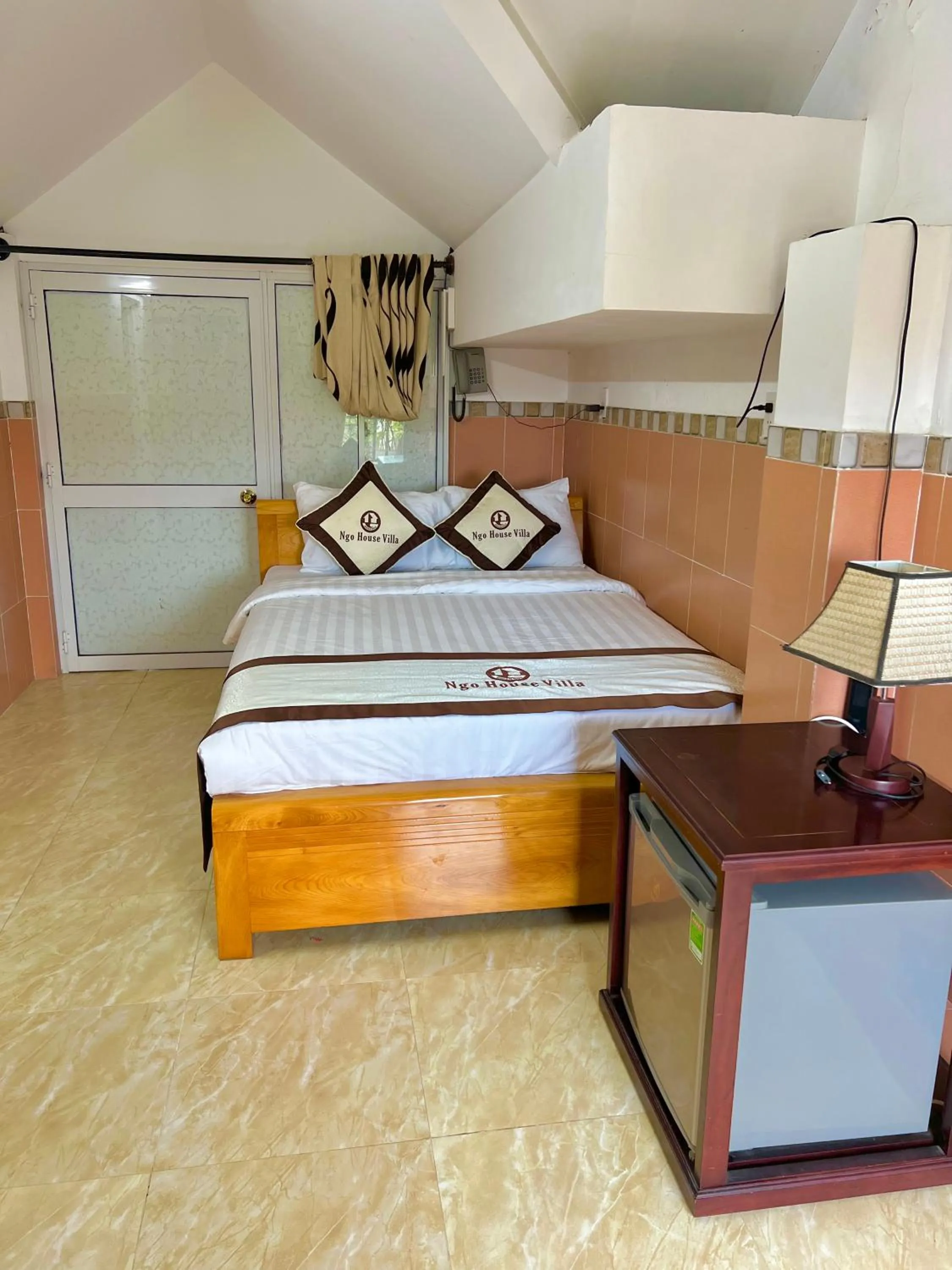 Bed in Ngo House Villa