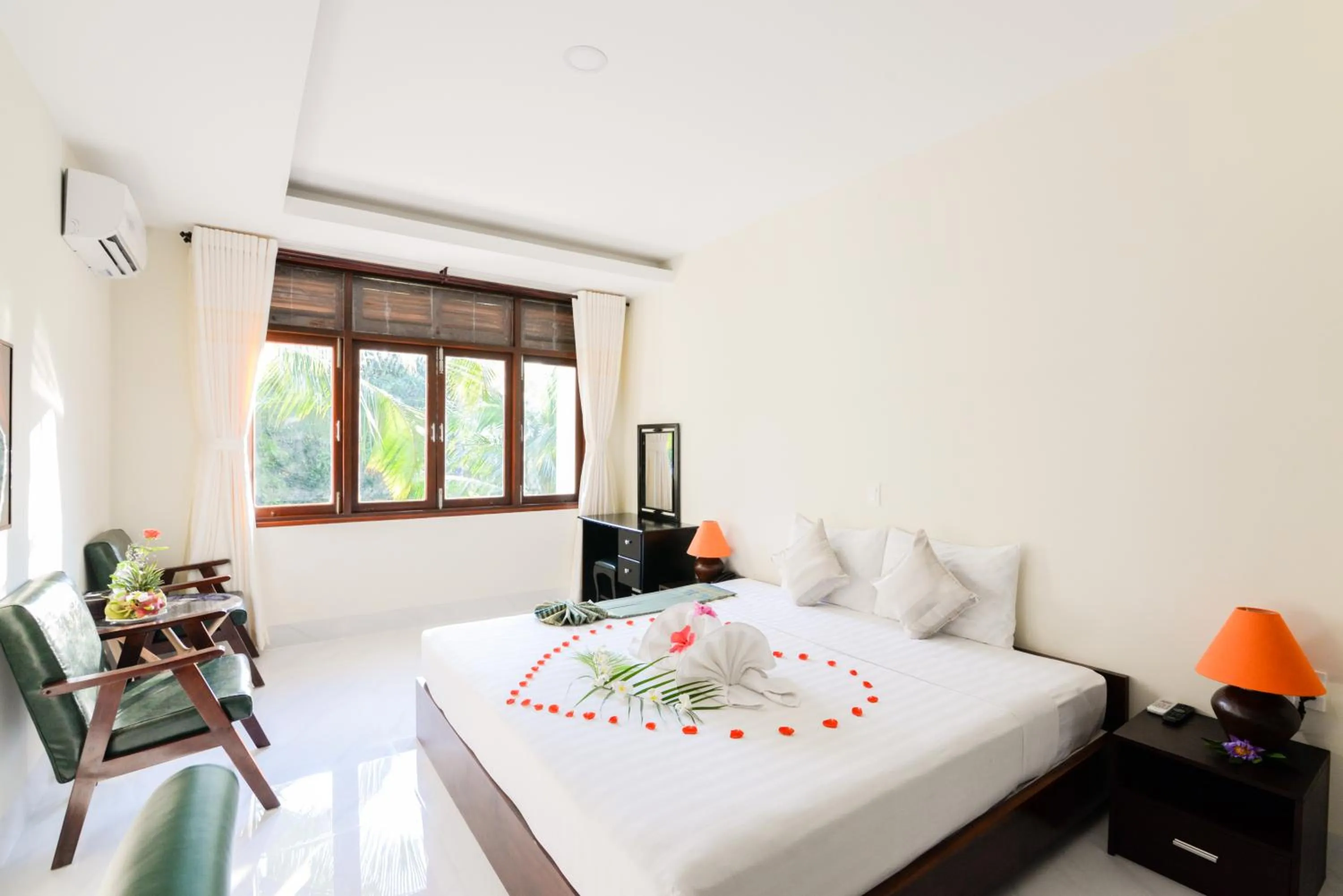 Photo of the whole room, Bed in Four Oceans Beach Resort - Bon Bien Mui Ne