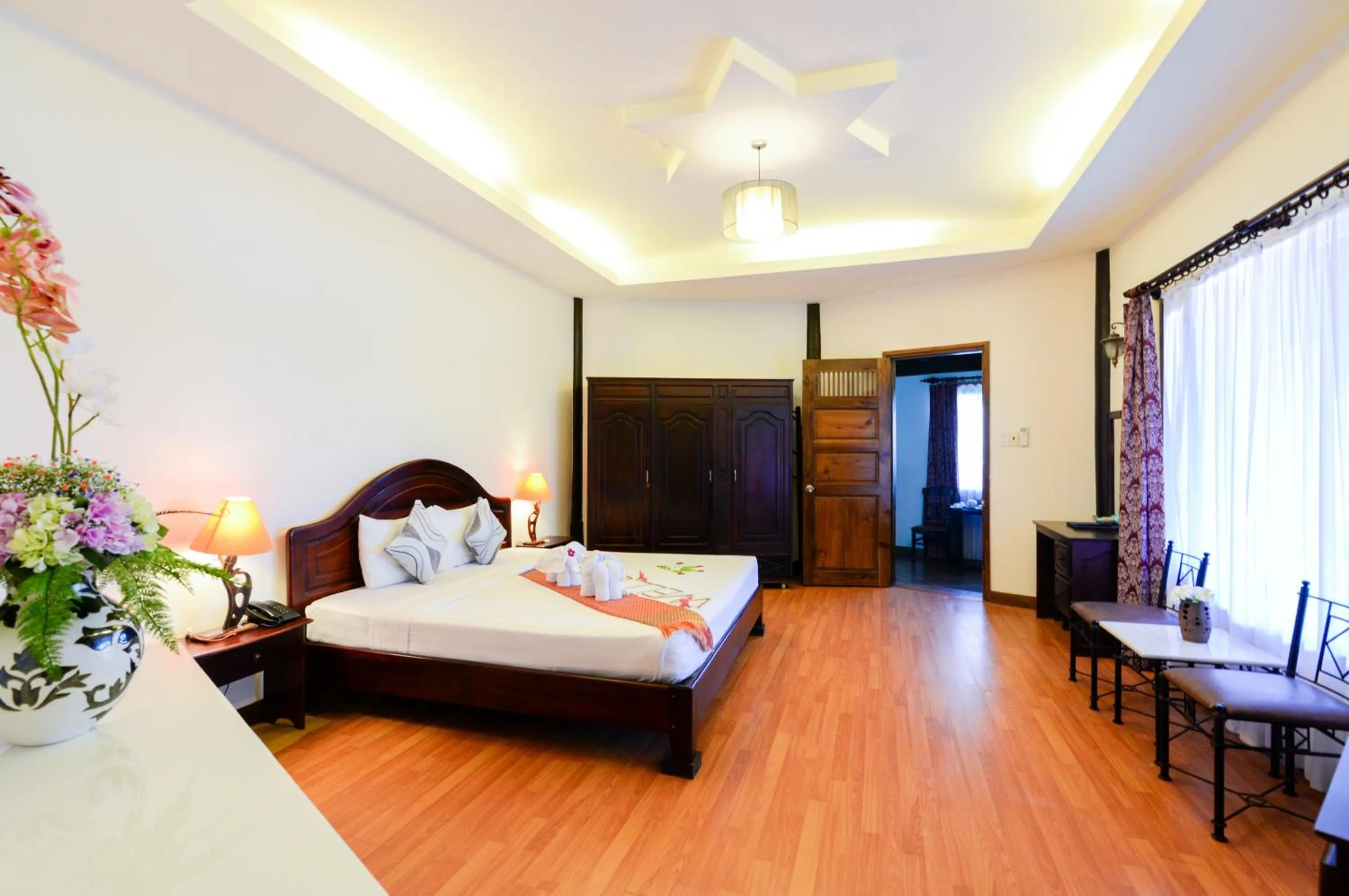 Photo of the whole room, Bed in Four Oceans Beach Resort - Bon Bien Mui Ne
