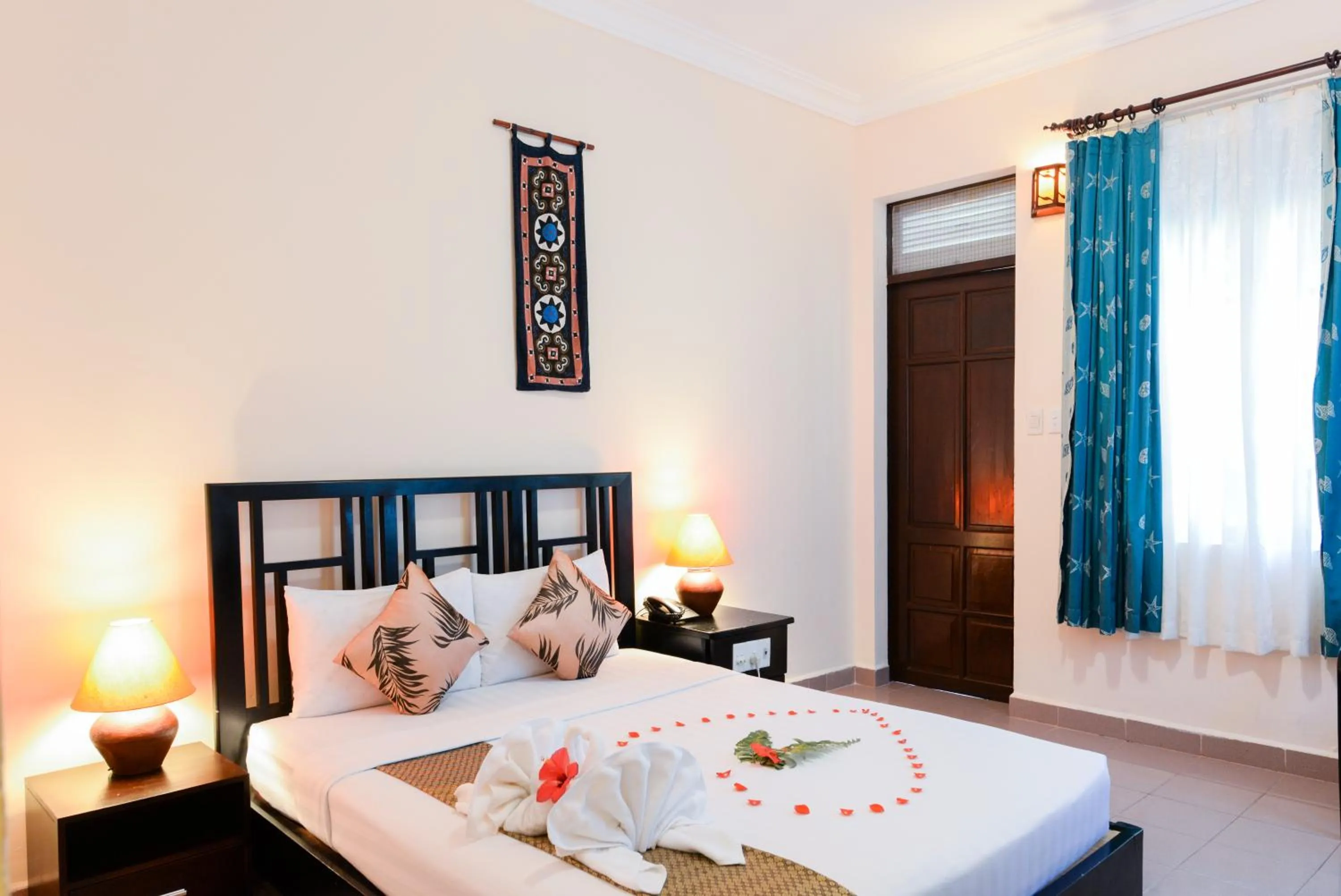 Photo of the whole room, Bed in Four Oceans Beach Resort - Bon Bien Mui Ne