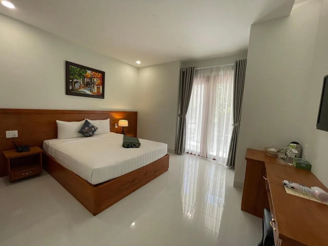Photo of the whole room, Bed in Four Oceans Beach Resort - Bon Bien Mui Ne