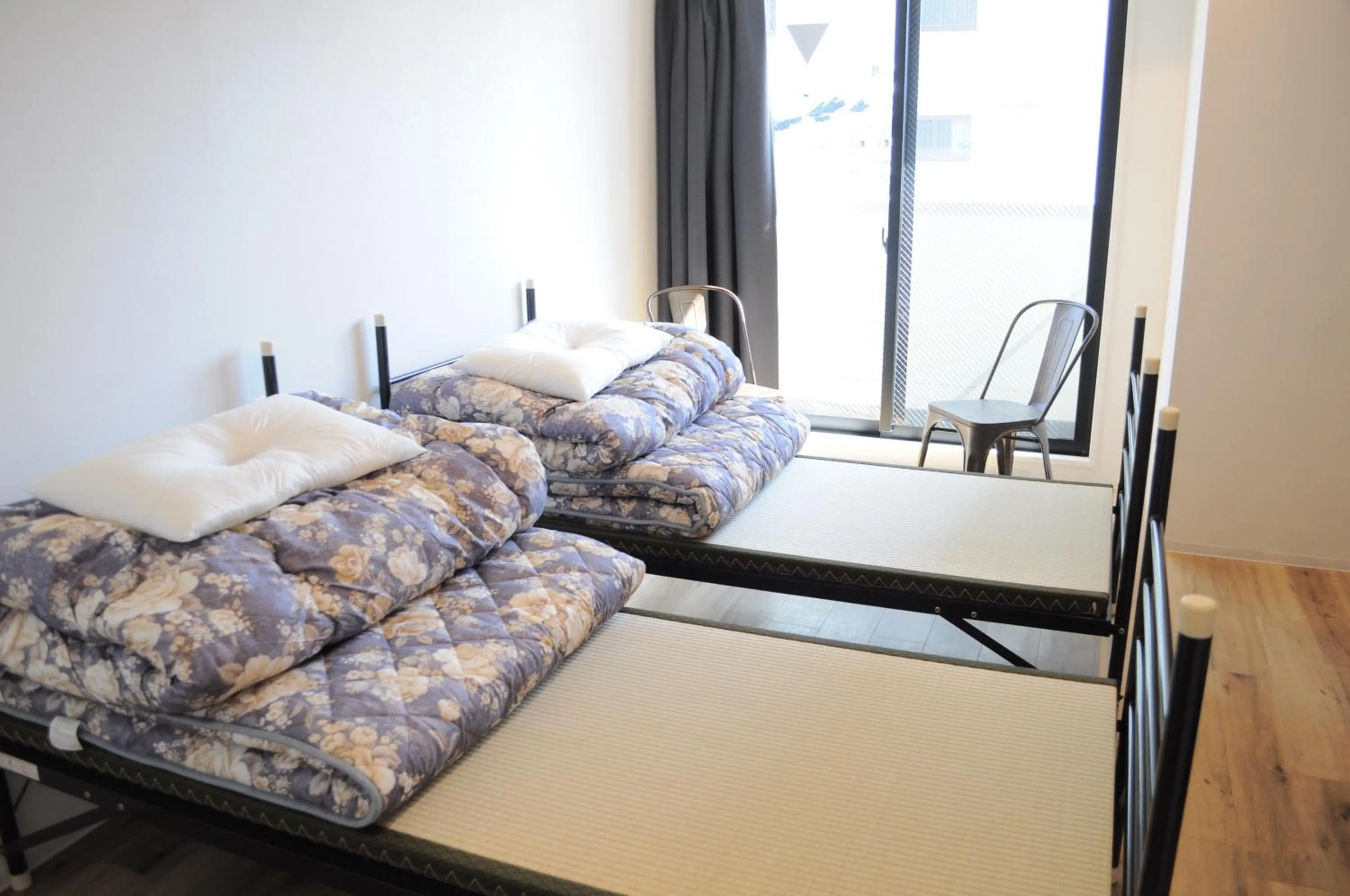 Bed, Seating Area in 04village Namba