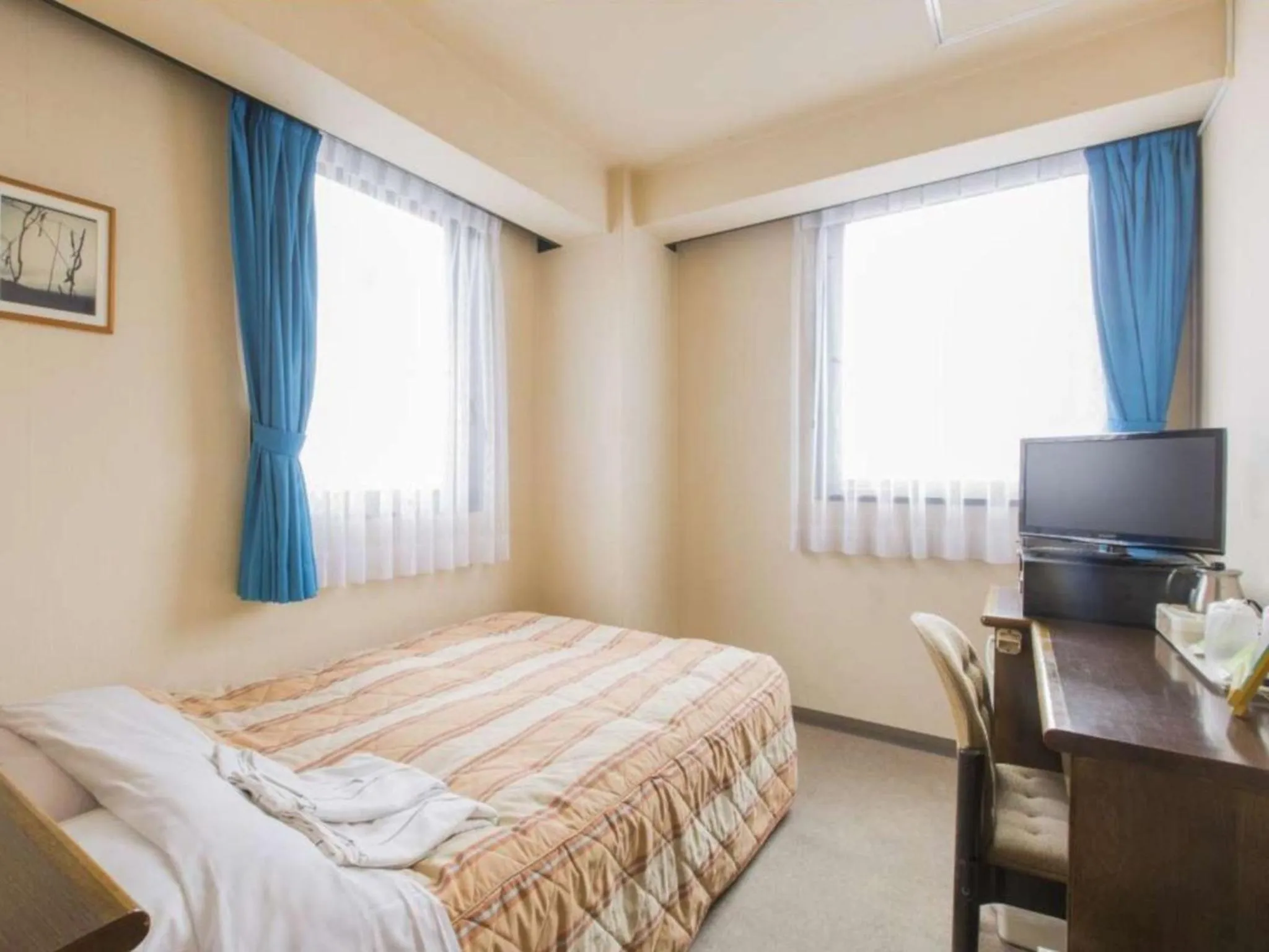 Bed in Hotel New Neo