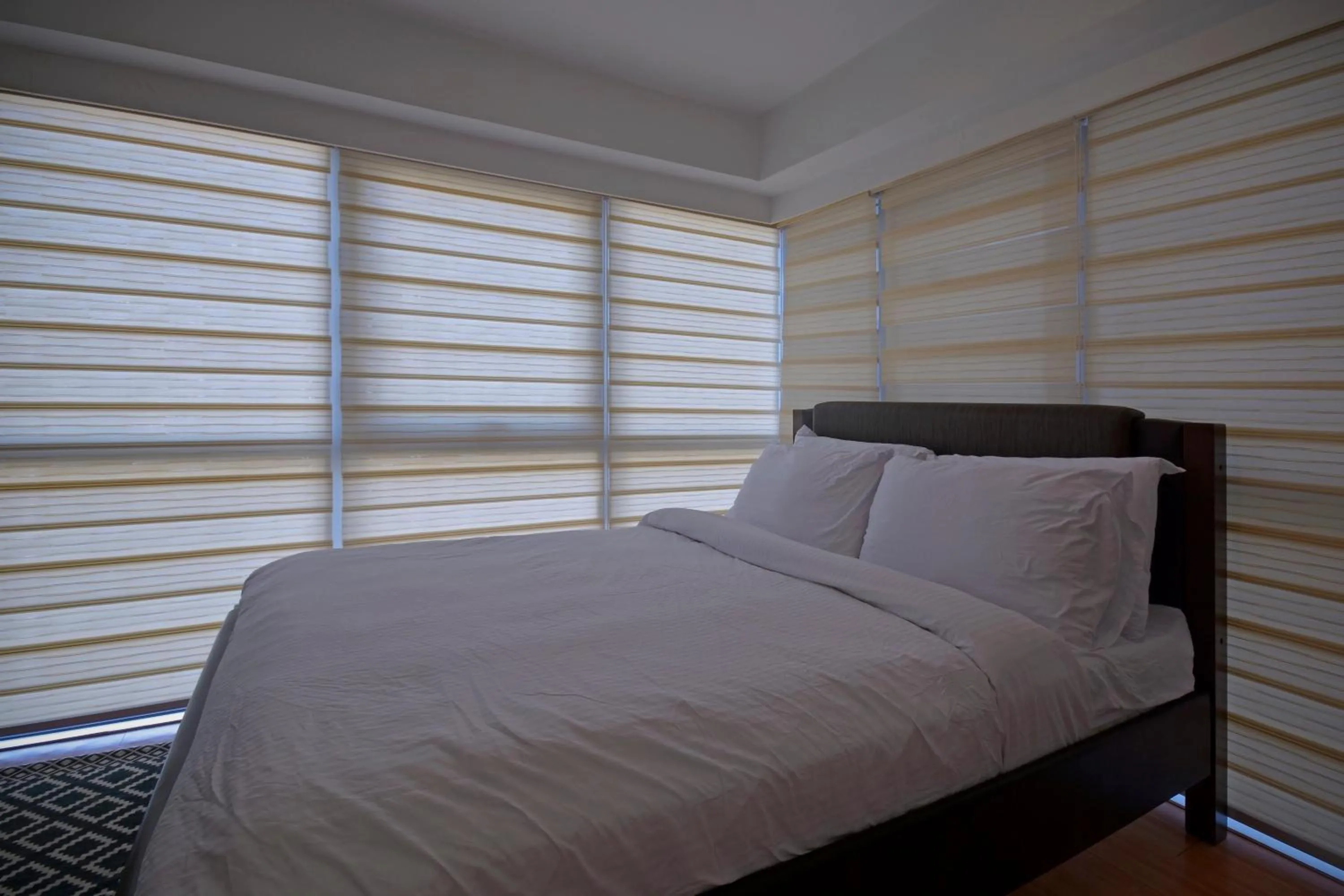 Bed in Victoria SOHO Suites