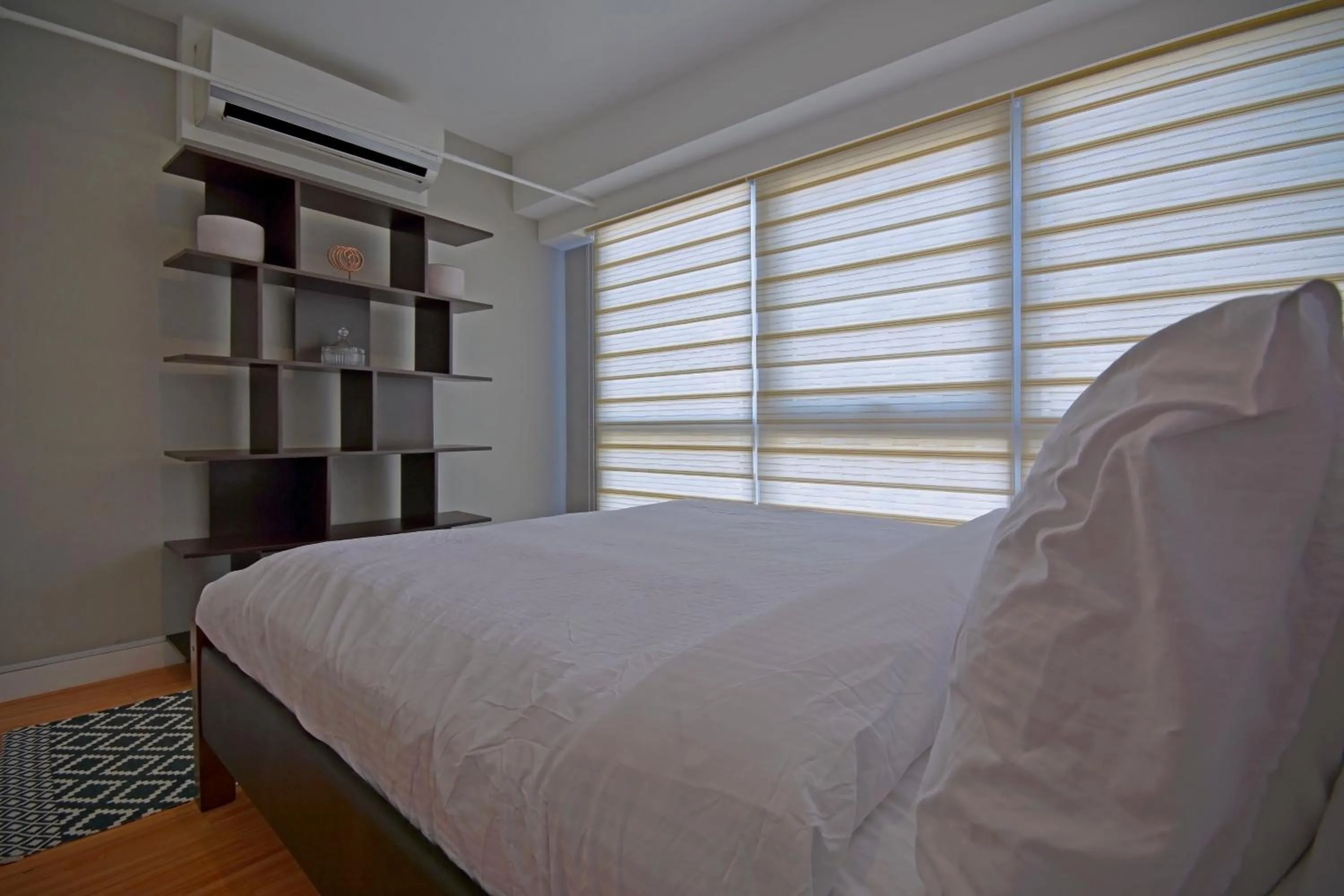 Bed in Victoria SOHO Suites