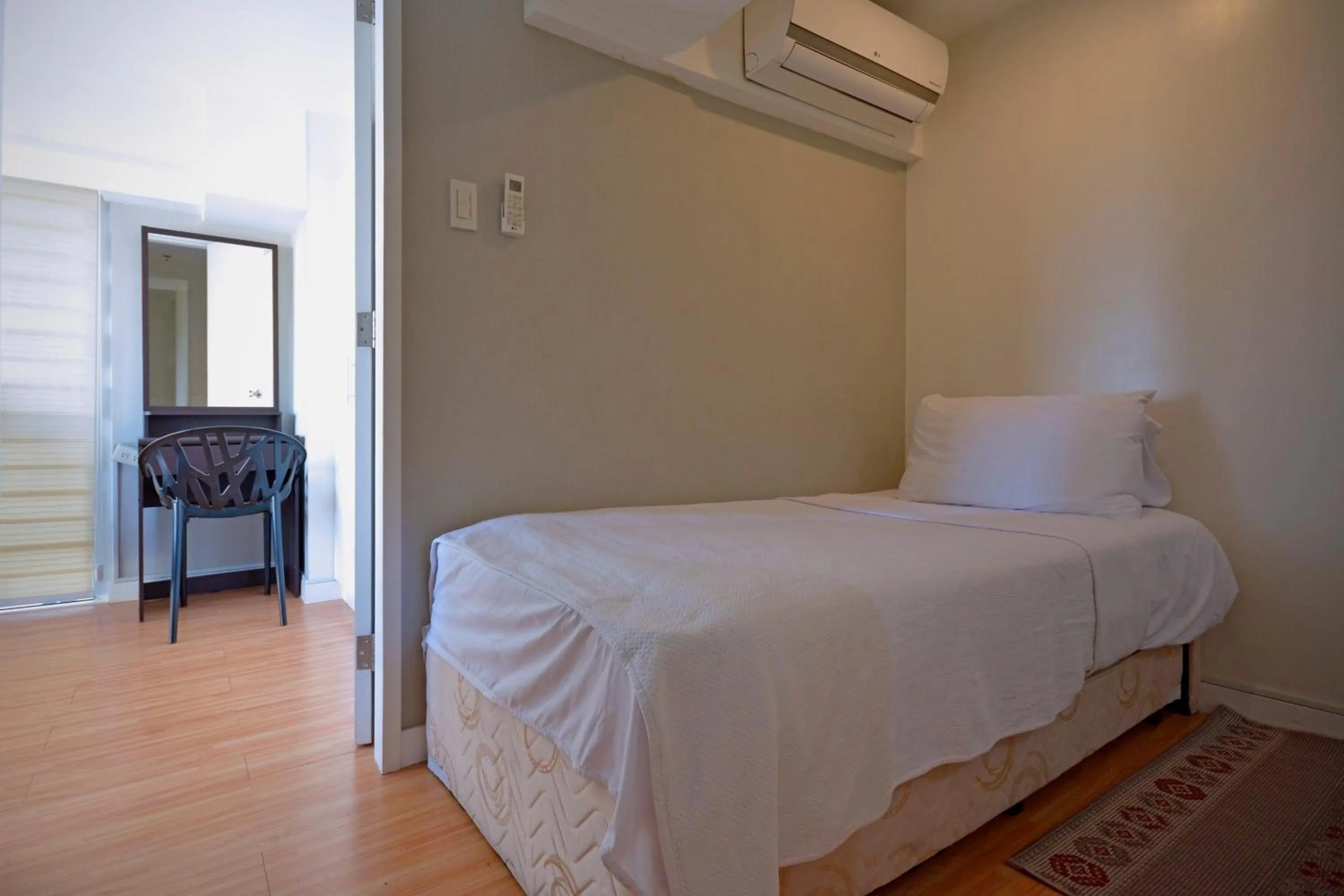 Bed in Victoria SOHO Suites