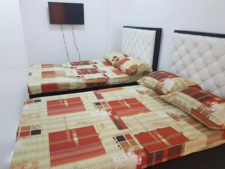 Bed in N&J Lopez Lodging House