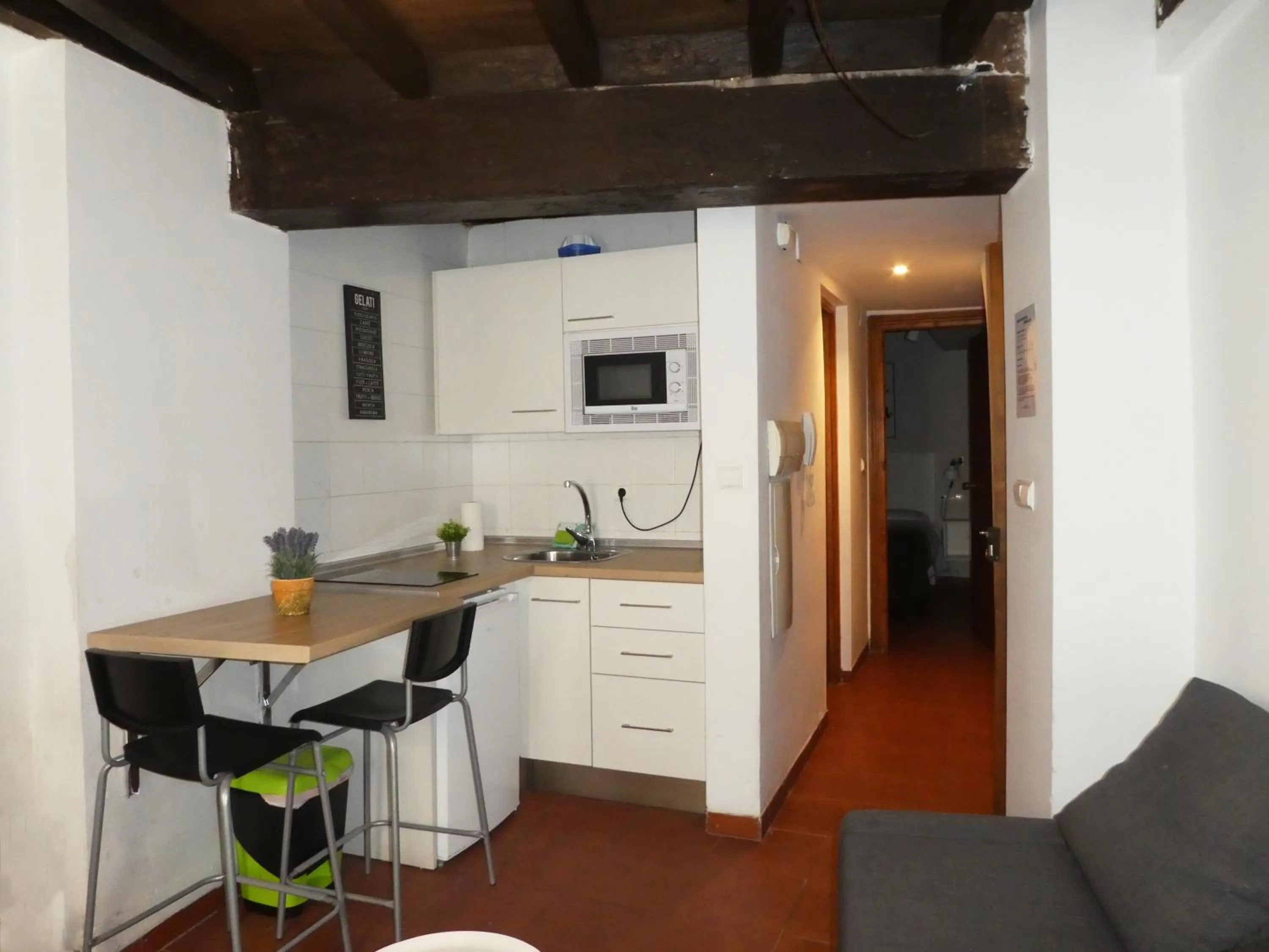 Kitchen or kitchenette in Apartamentos Nahira Suites 3000