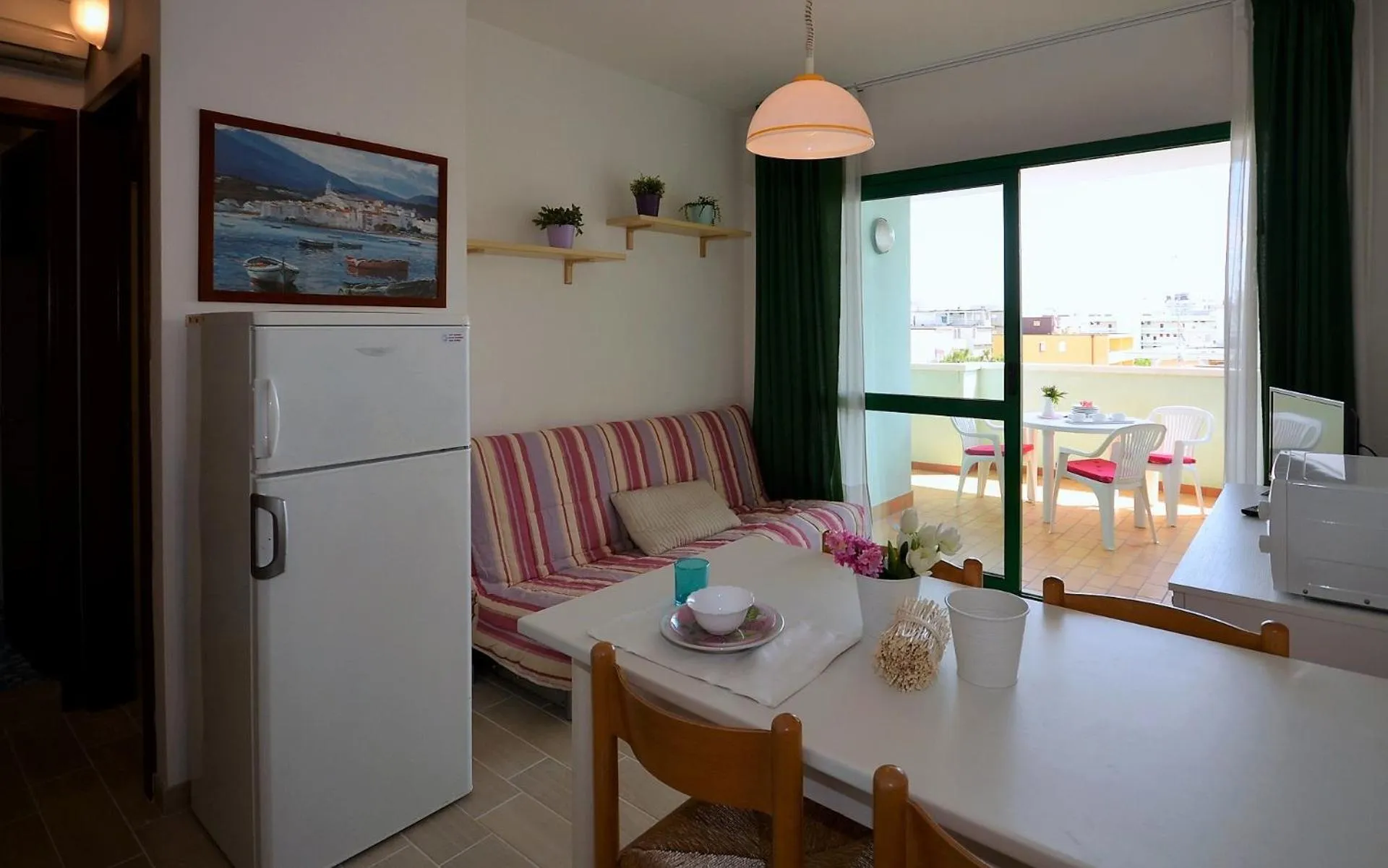 Kitchen or kitchenette in Appartamenti Acquaverde