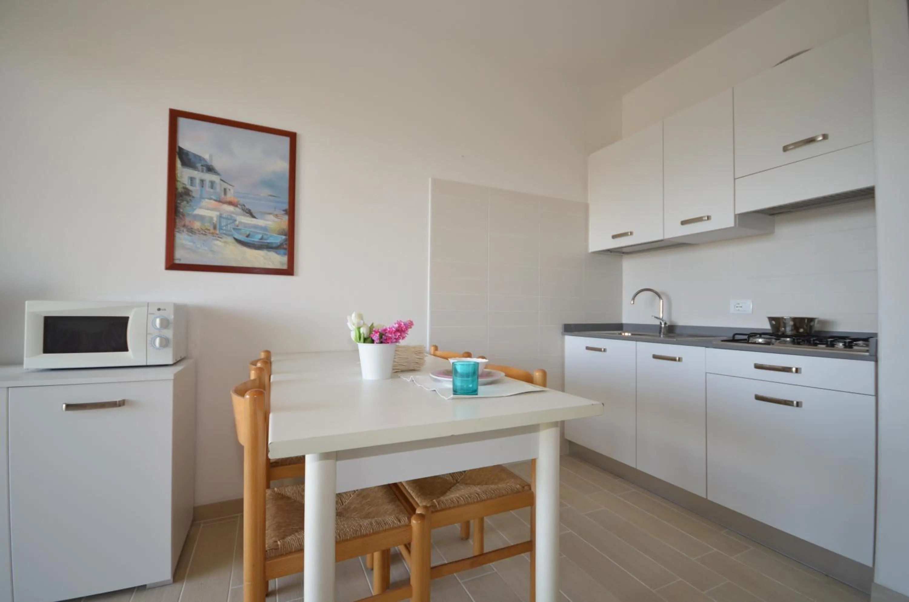 Kitchen or kitchenette in Appartamenti Acquaverde