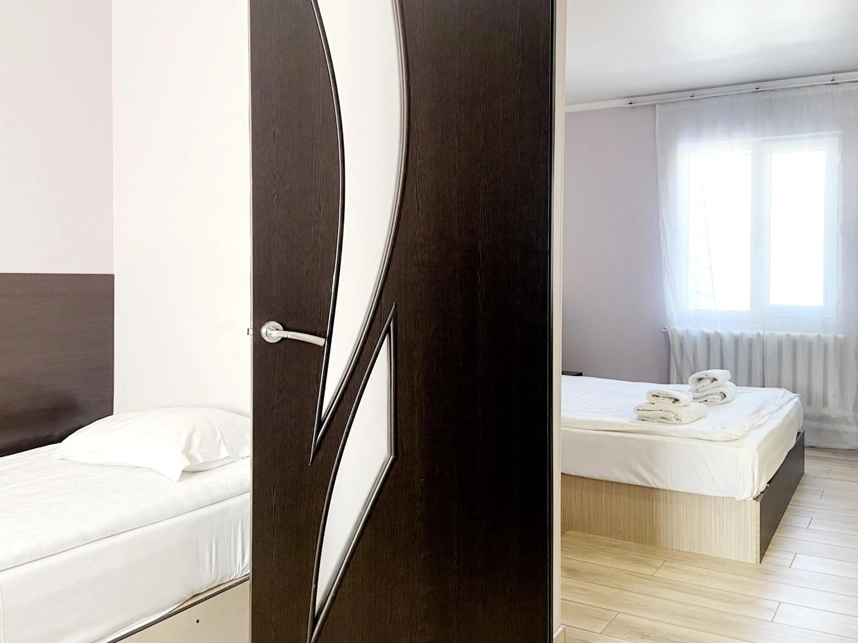 Bed in TourAsia Hotel