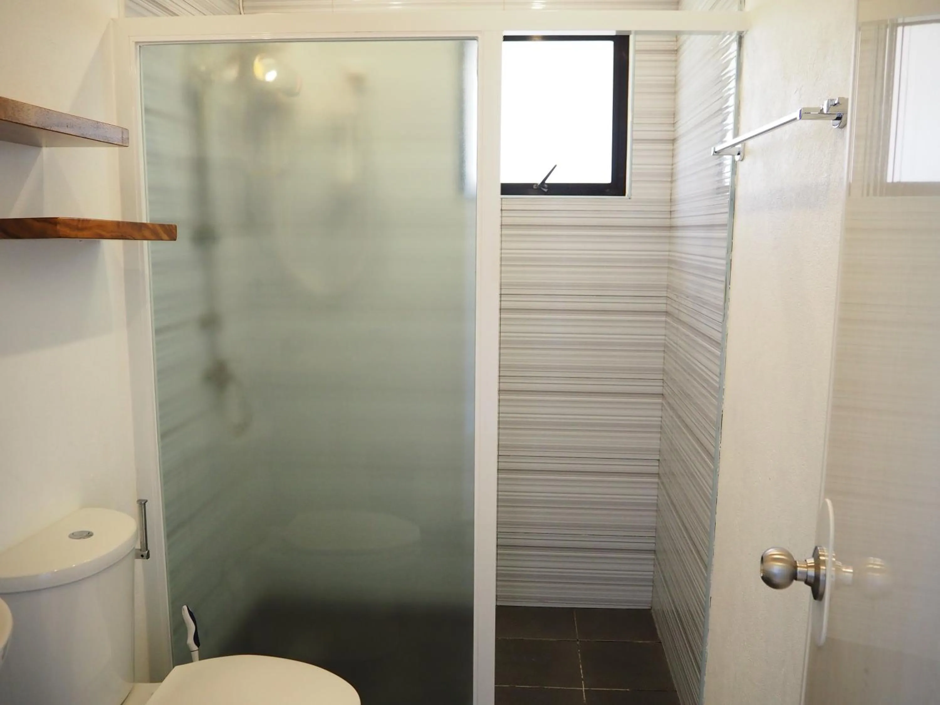 Shower in Footprints Beach Resort