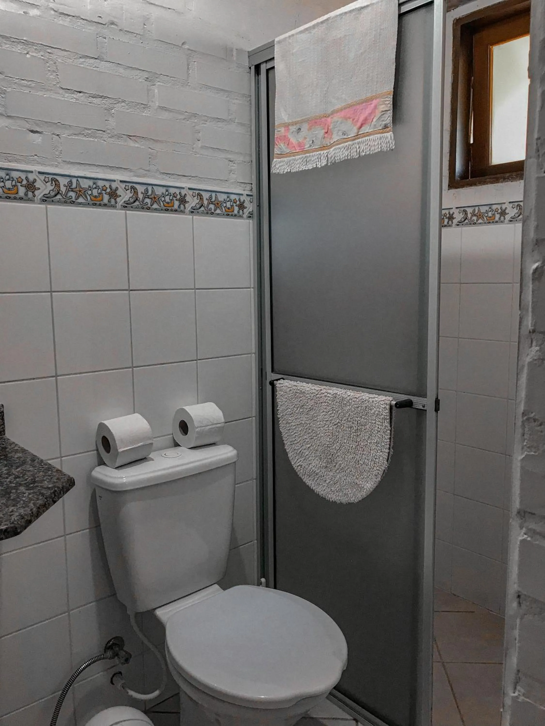 Bathroom in Doce Cabana Pousada
