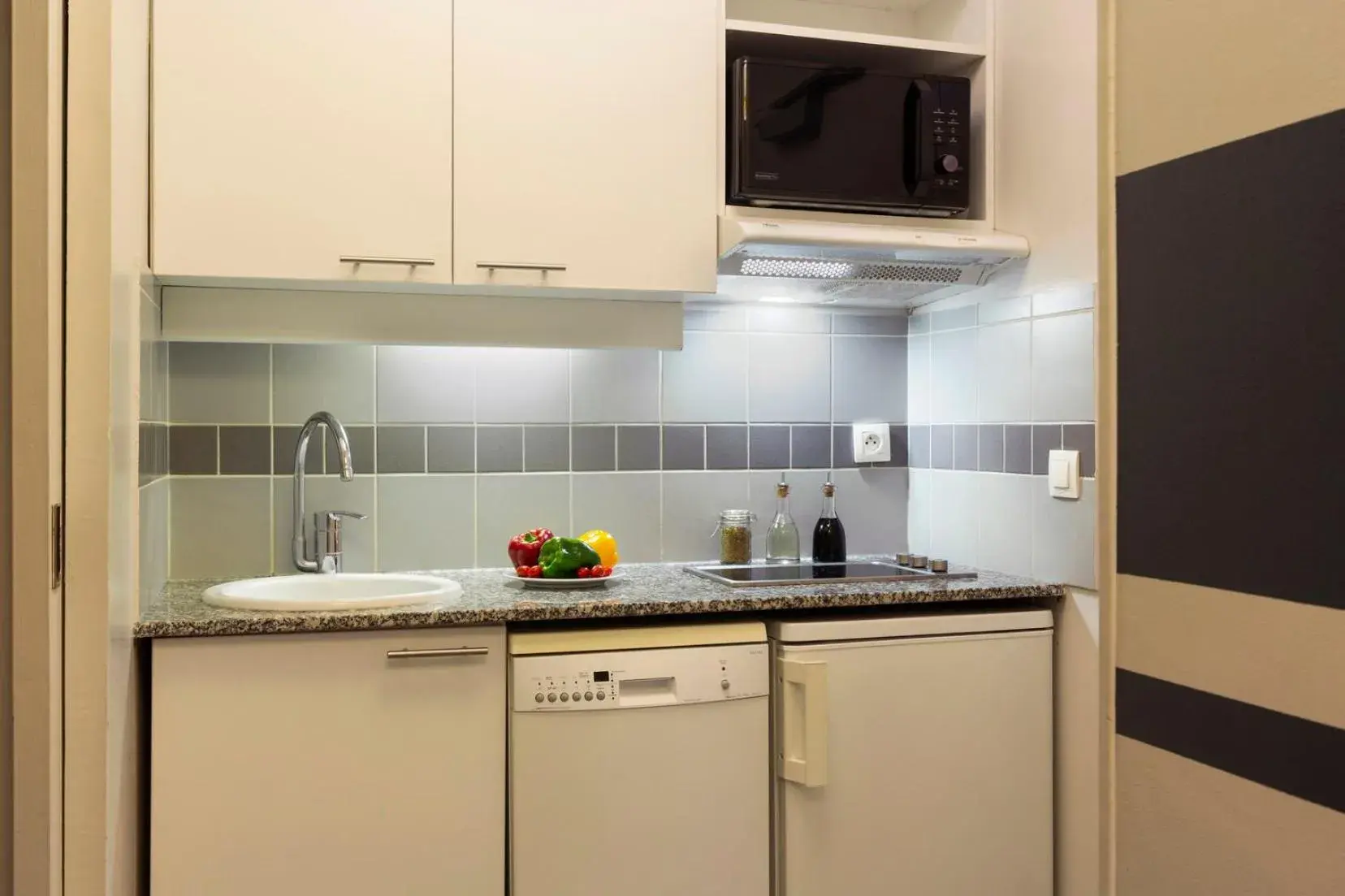 Kitchen or kitchenette in Citadines City Centre Lille Kitchen or kitchenette in Citadines City Centre Lille