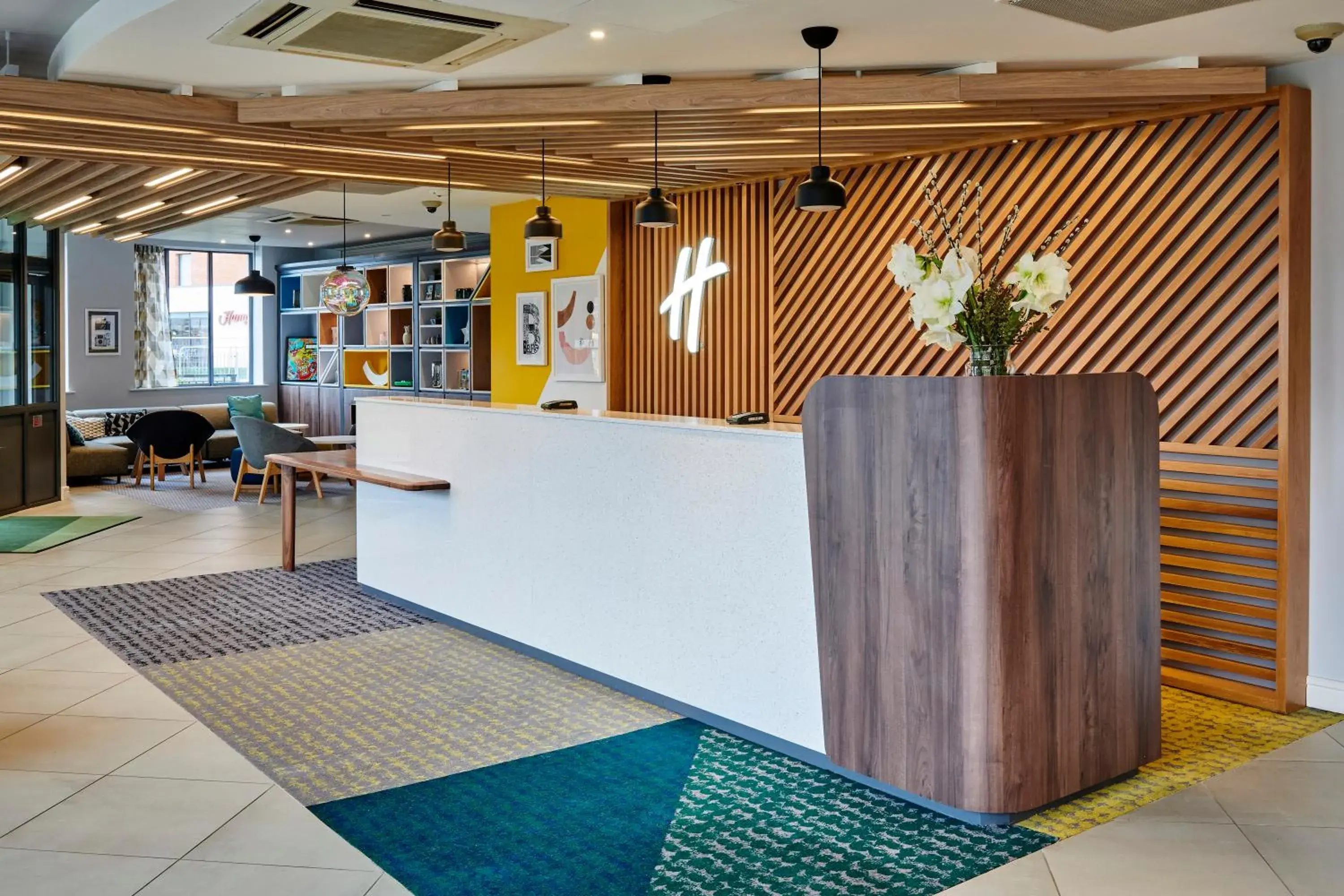 Lobby or reception in Holiday Inn Belfast by IHG Lobby or reception in Holiday Inn Belfast by IHG