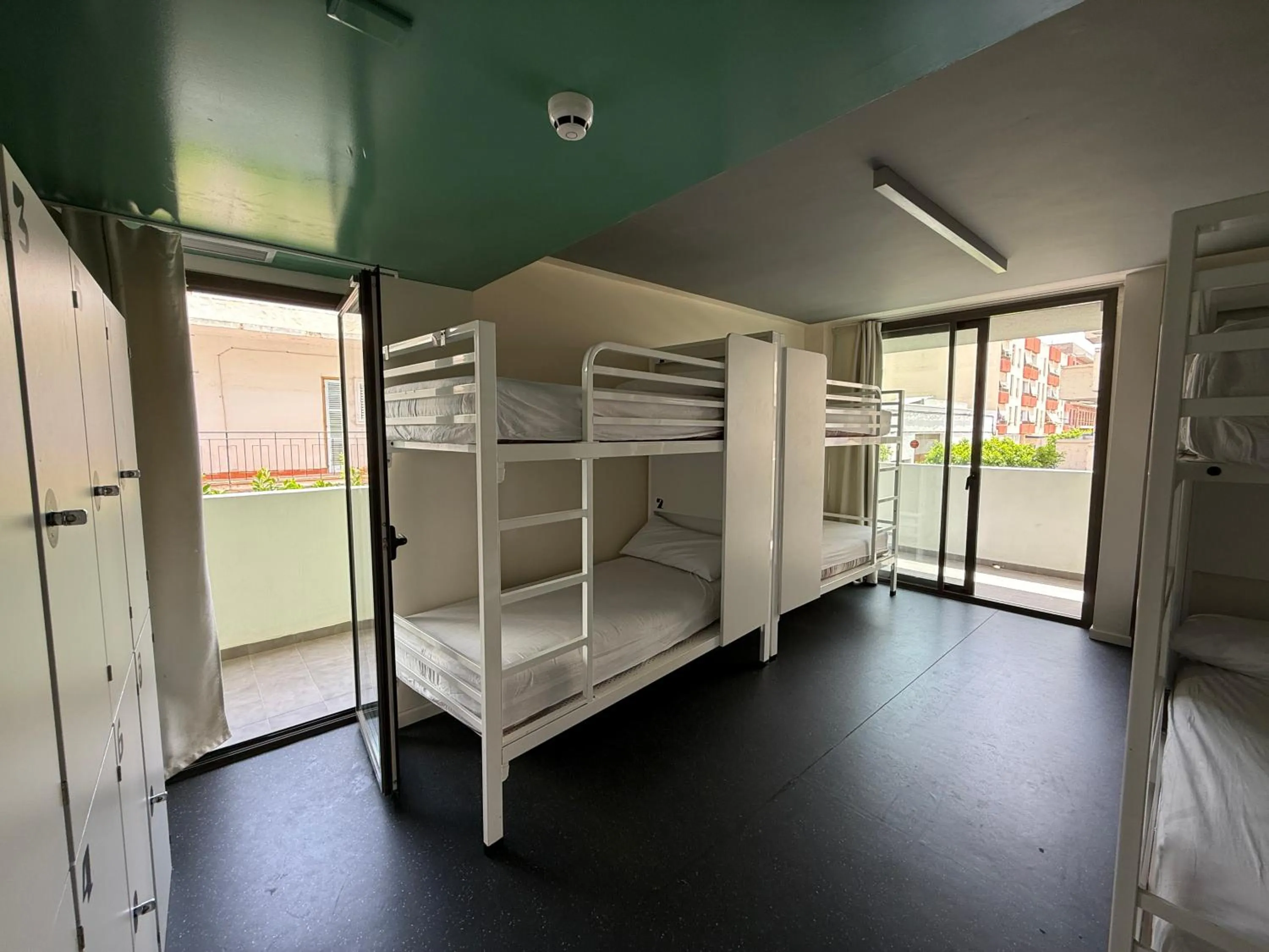 Photo of the whole room, Bed in AMISTAT Island Hostel Ibiza - ALBERGUE JUVENIL