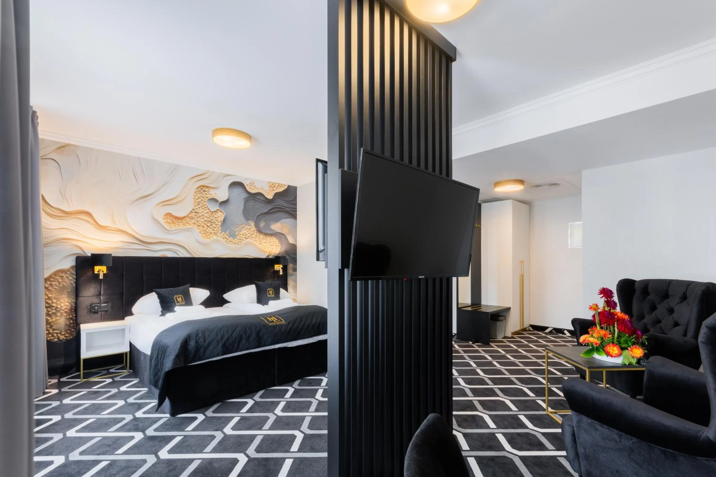 Living room, Bed in Hotel Lantier & Swimming Pool Zone