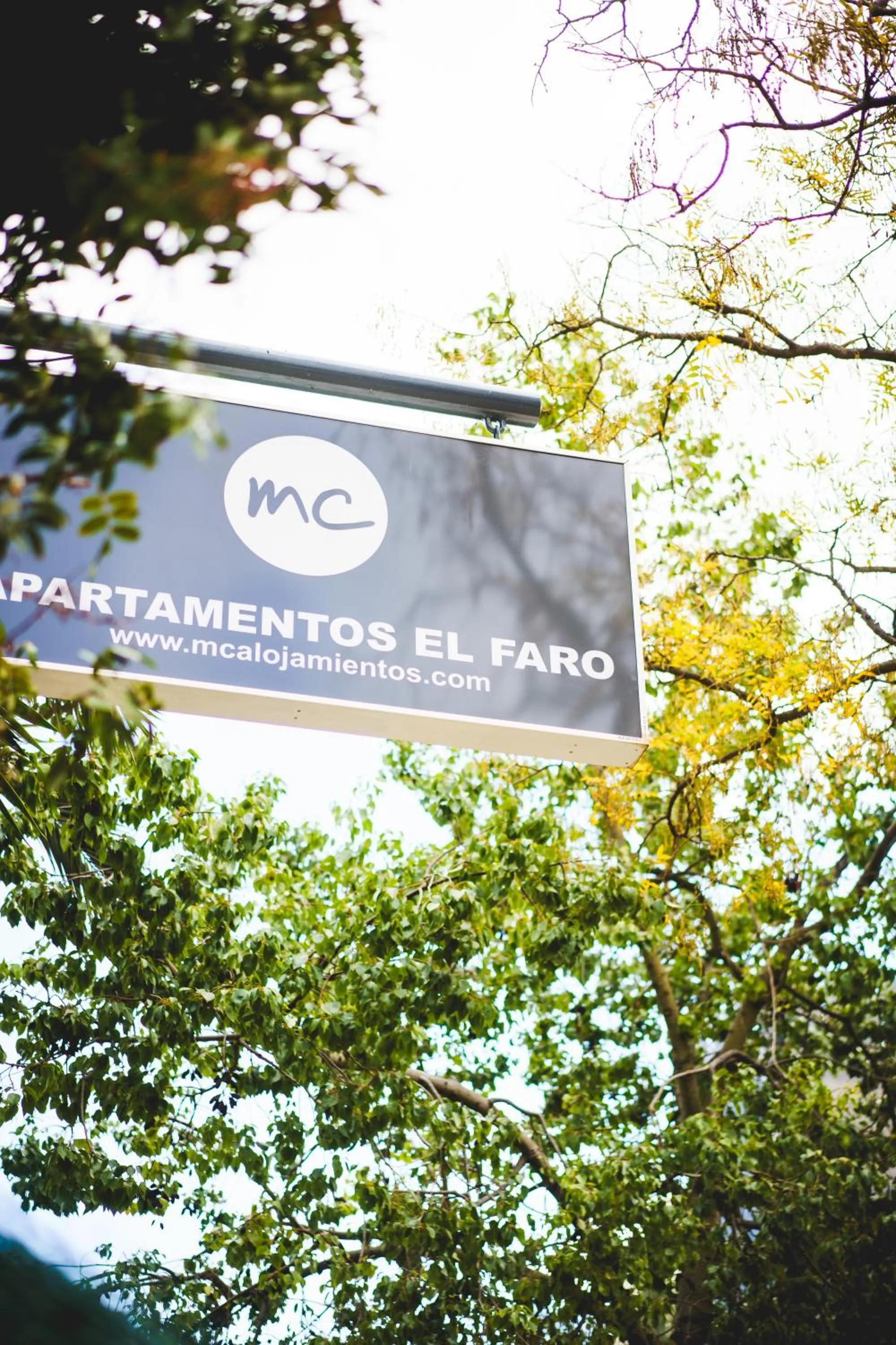 Property logo or sign in Apartamentos El Faro By Mc