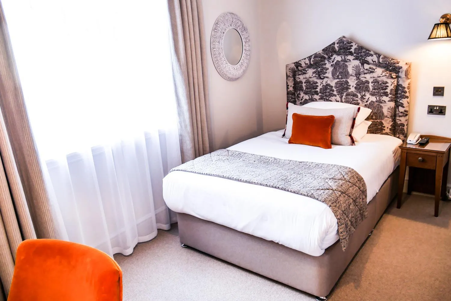 Bed in The Maids Head Hotel