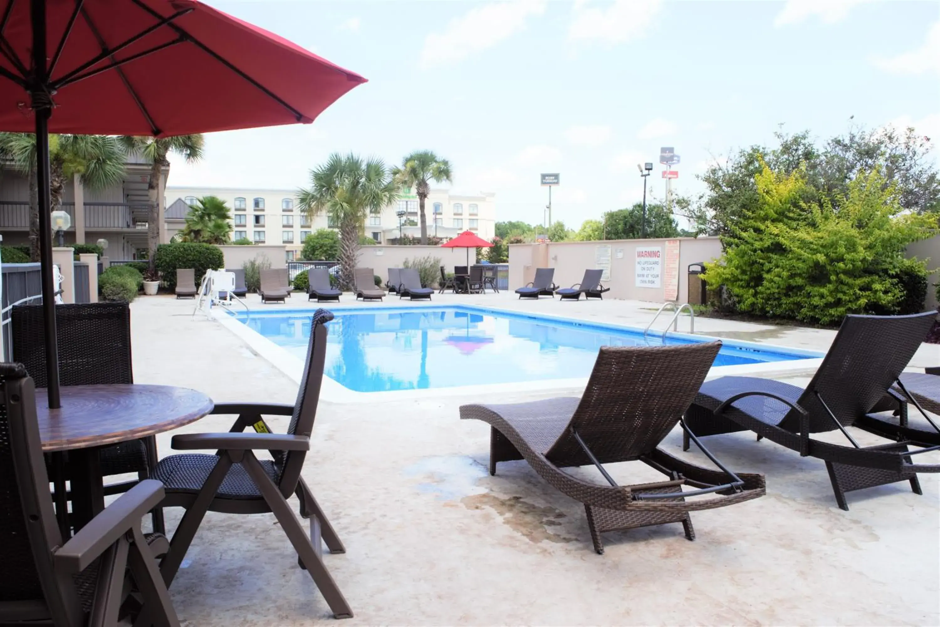 Swimming pool in Ramada by Wyndham Savannah Gateway Swimming pool in Ramada by Wyndham Savannah Gateway