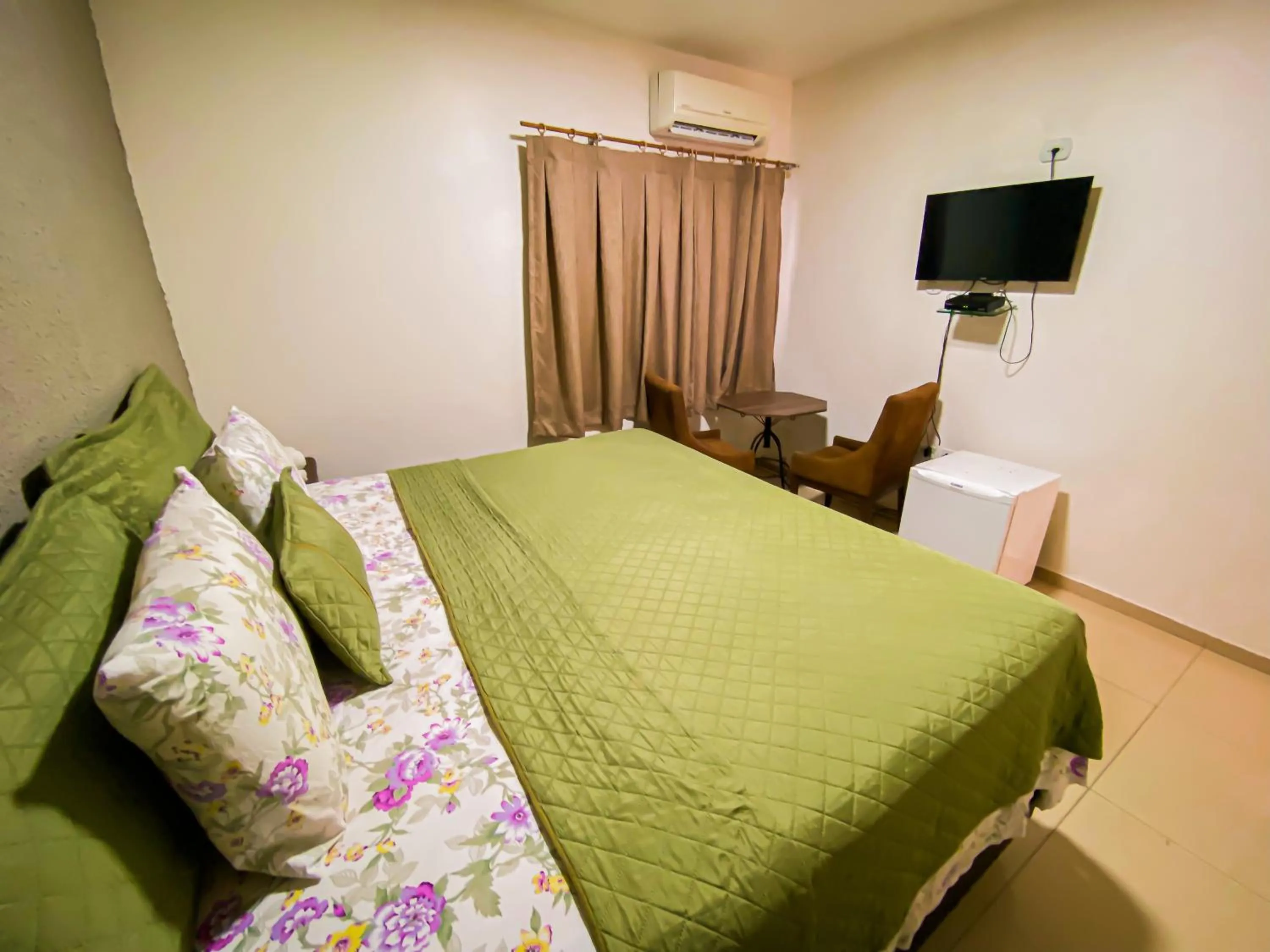 Bed in Hotel Pequeno Principe