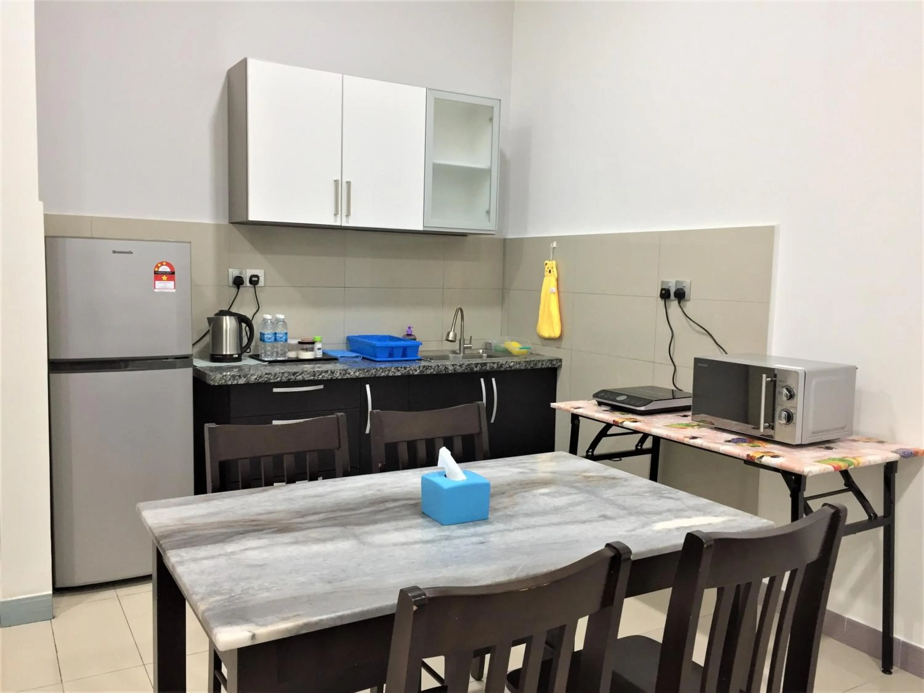 Kitchen or kitchenette in Borneo Coastal Residence @ IMAGO Mall