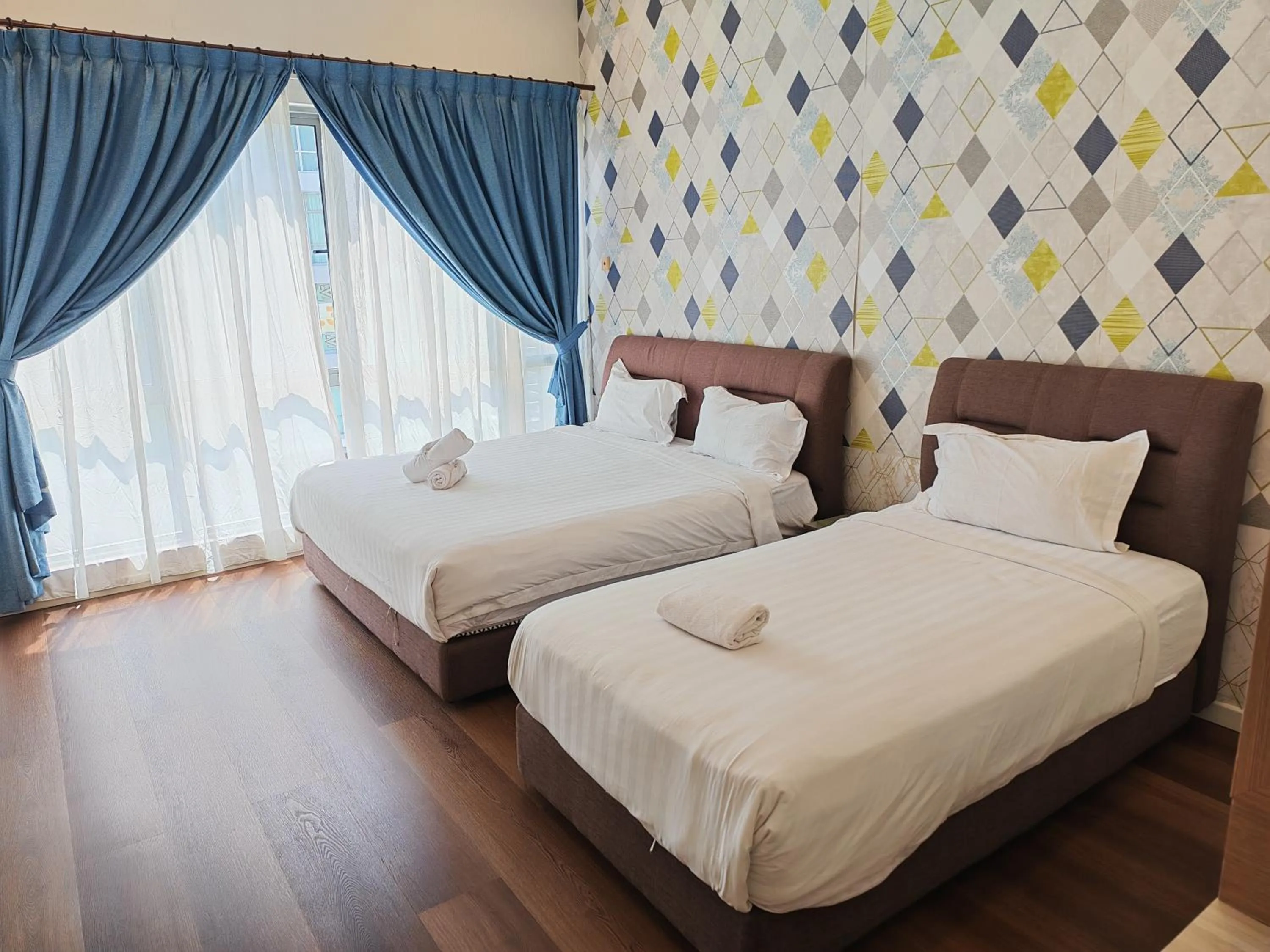 Bed in Borneo Coastal Residence @ IMAGO Mall