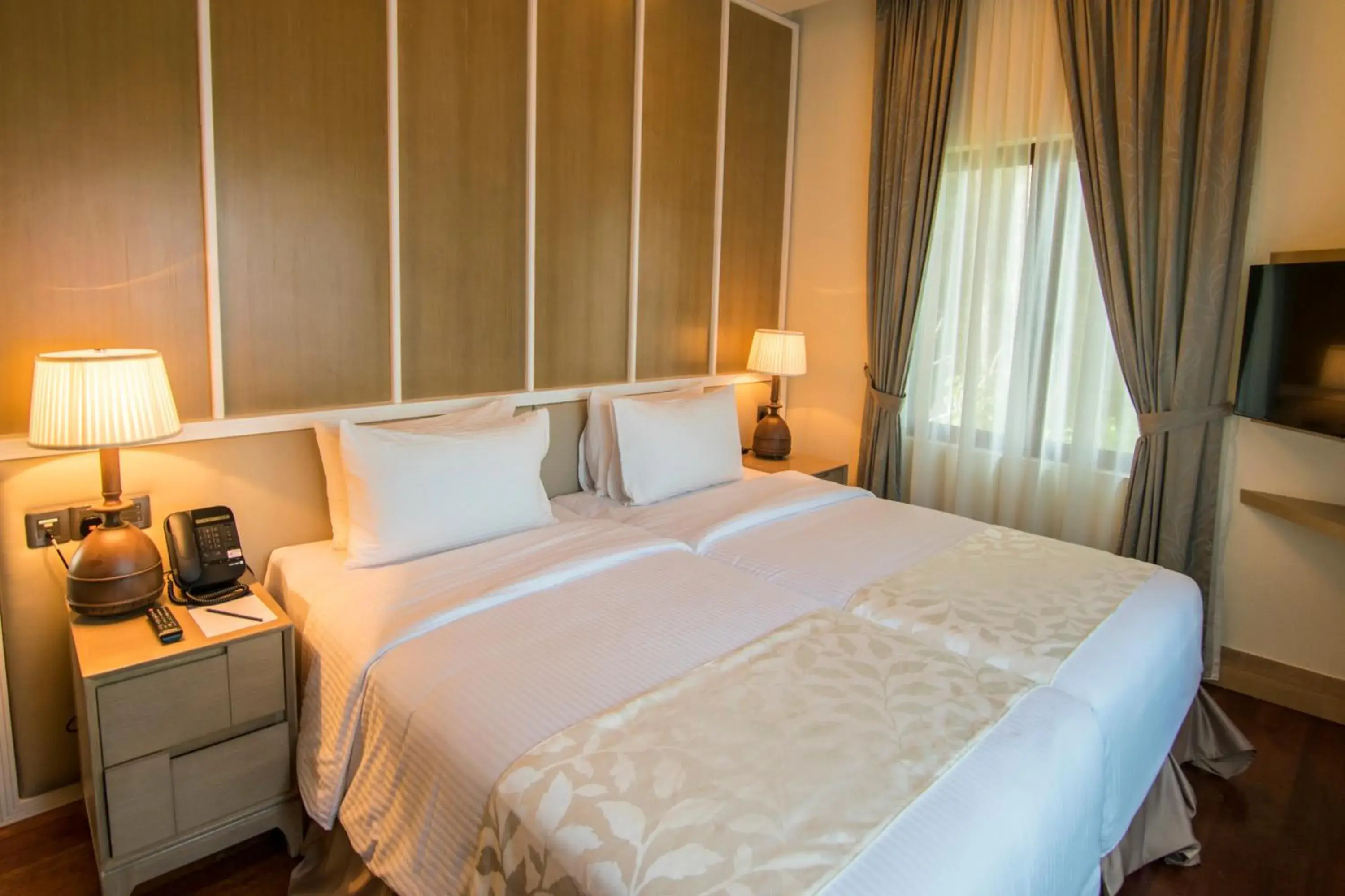 Bed in Royale Chulan Cherating Villa Bed in Royale Chulan Cherating Villa