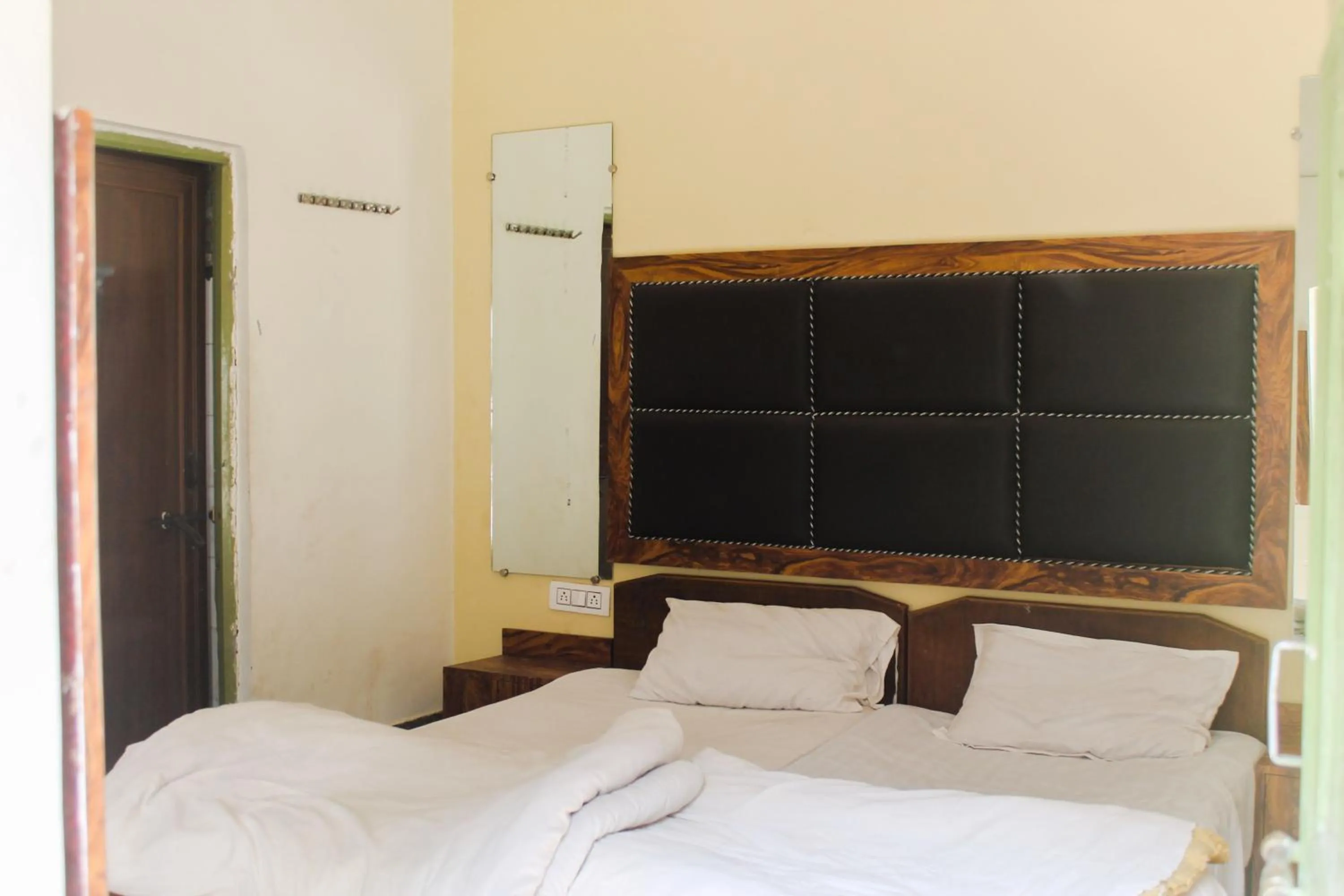 View (from property/room), Bed in Hotel Anand Palace