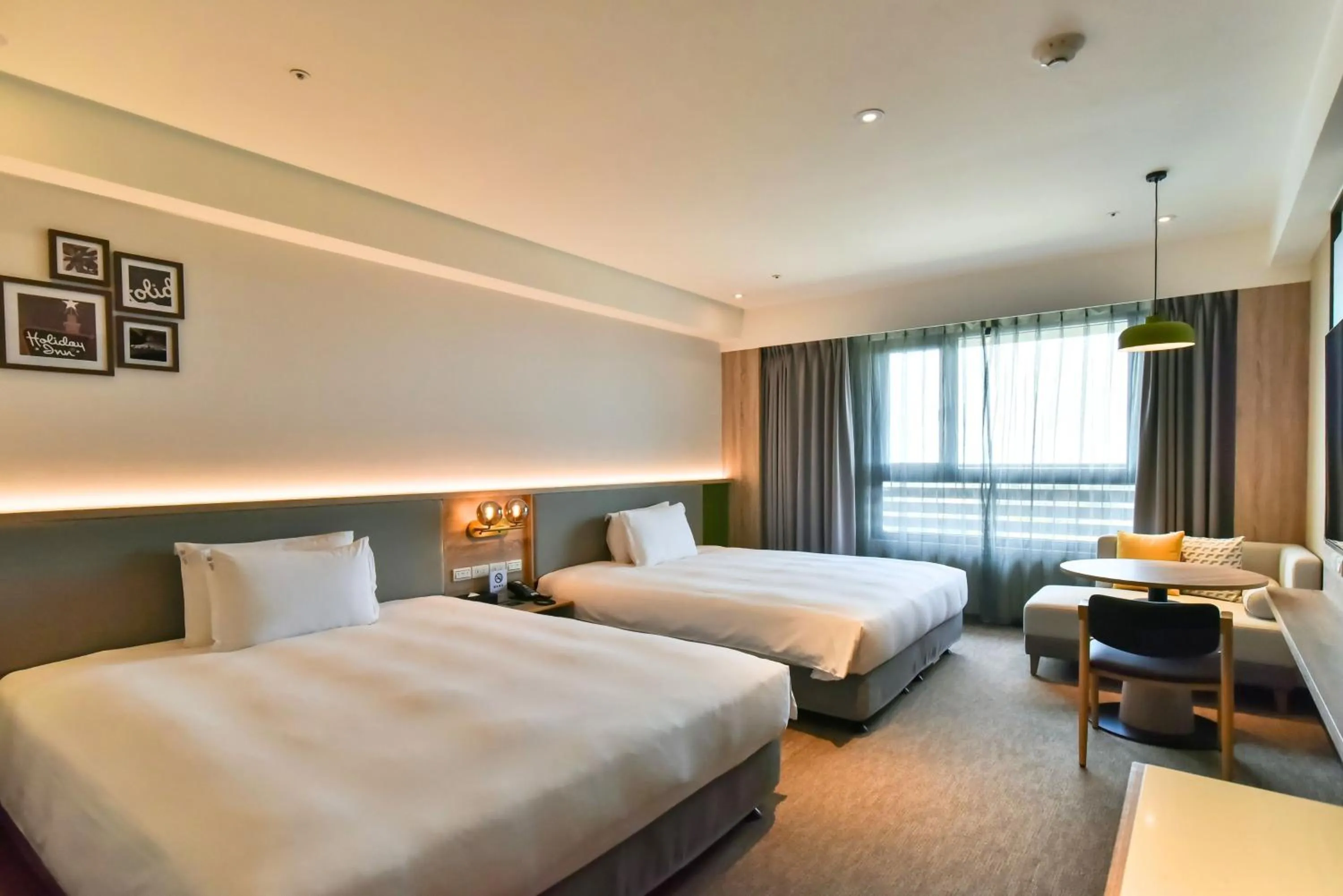 Photo of the whole room, Bed in Holiday Inn Taoyuan Airport by IHG