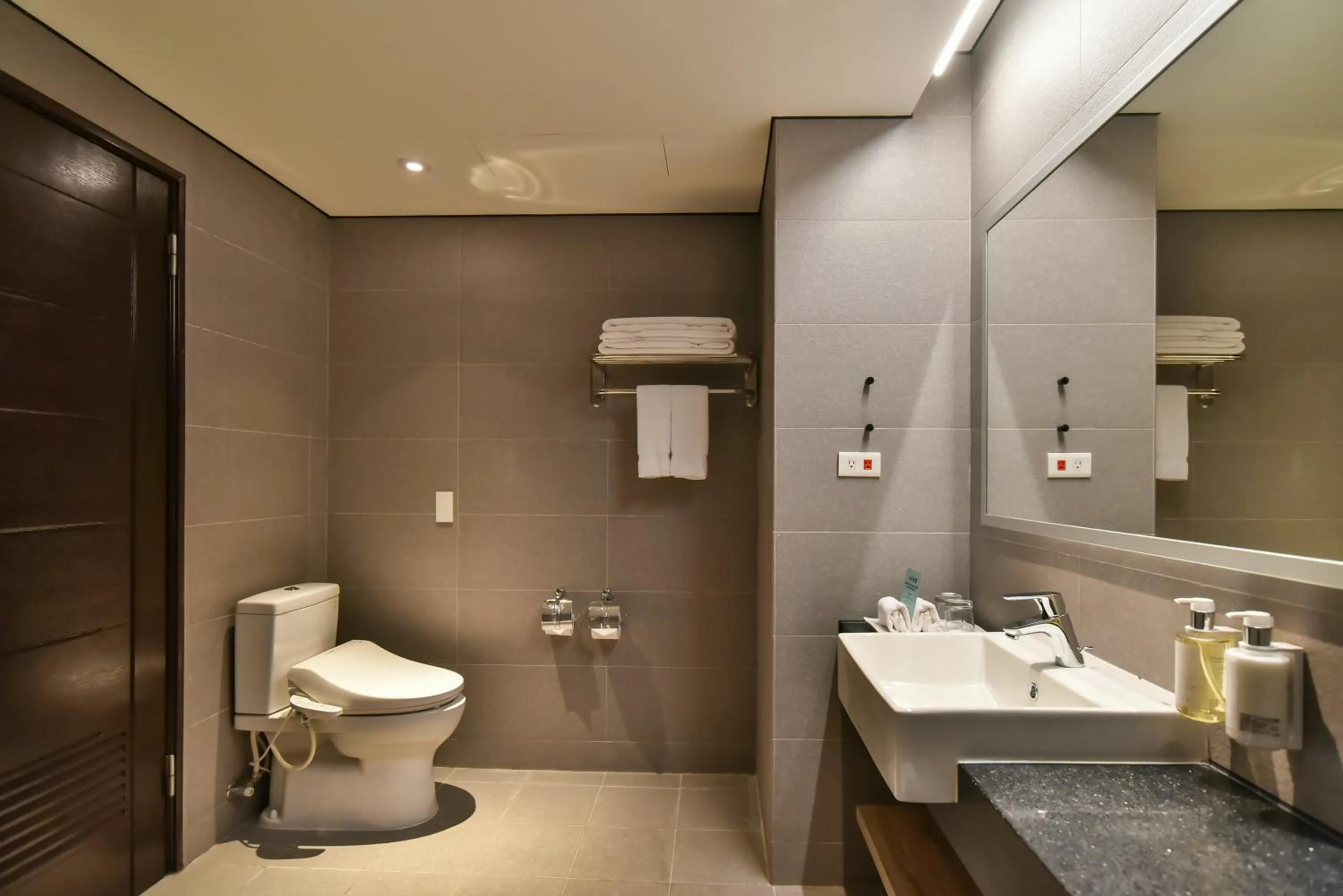 Bathroom in Holiday Inn Taoyuan Airport by IHG
