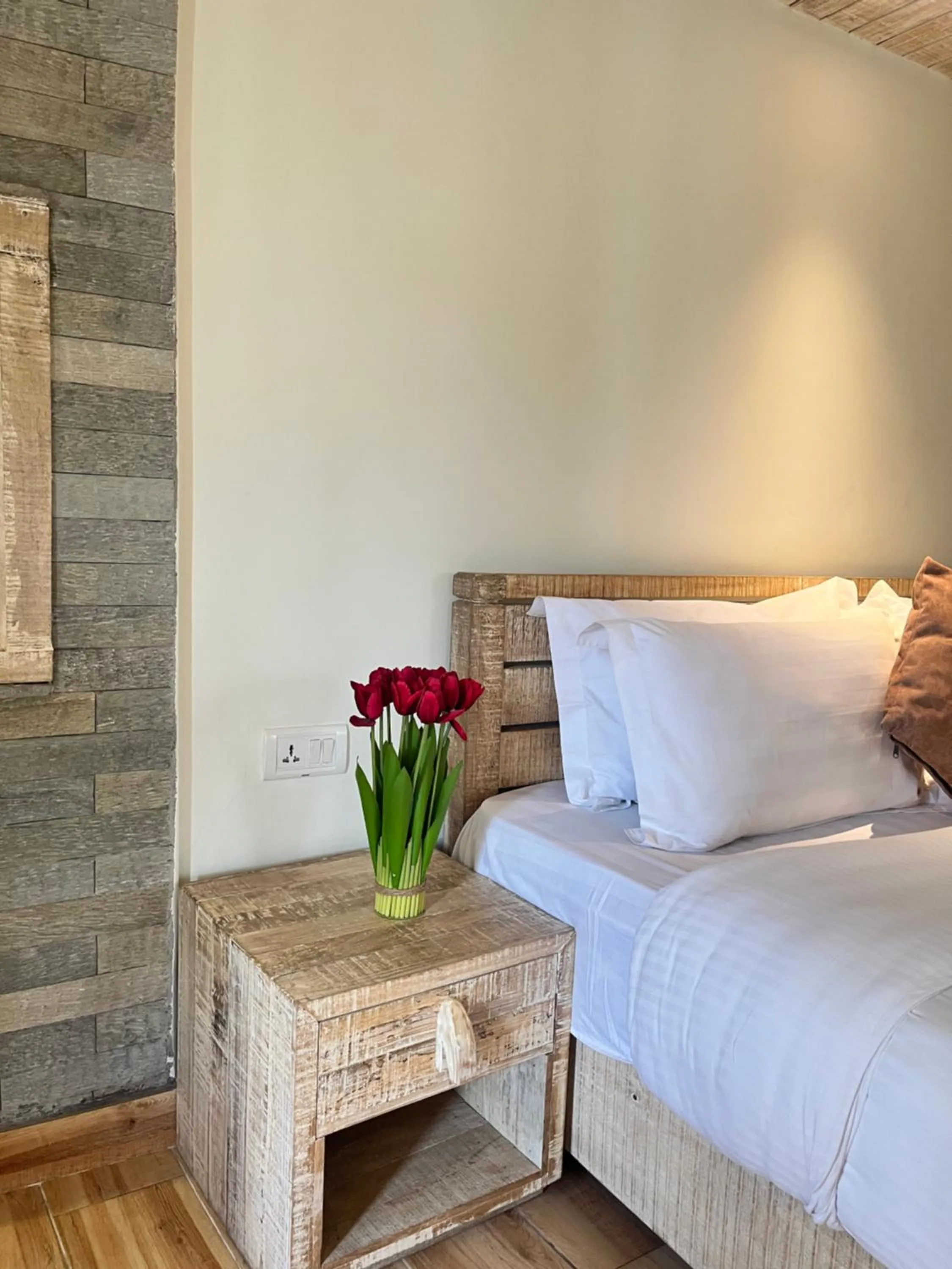 Bed in Kuti Resort & Spa