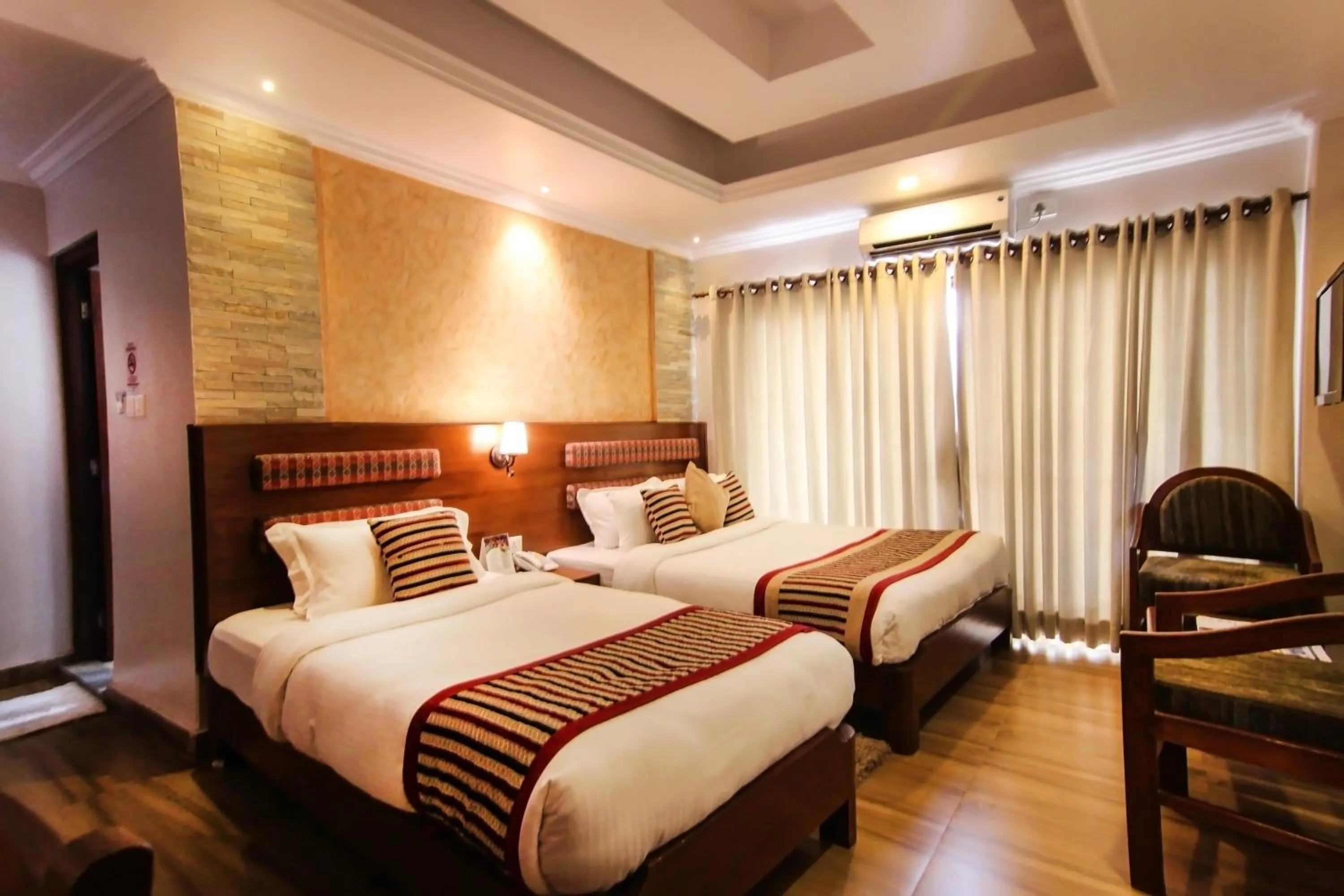 Bed in Kuti Resort & Spa