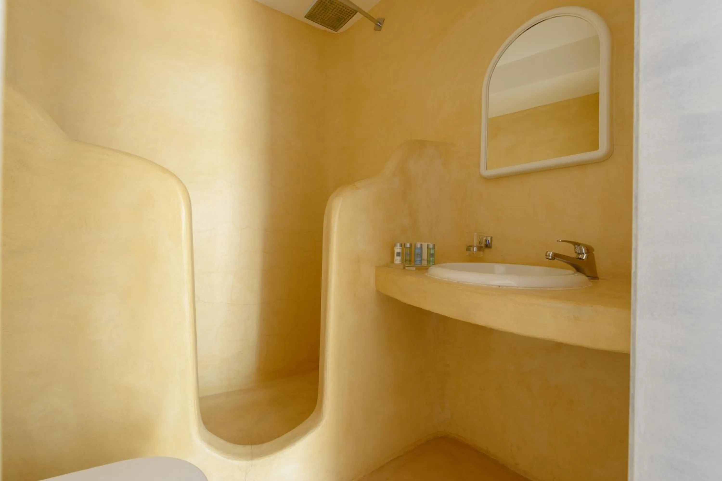 Bathroom in Abyssanto Suites and Spa