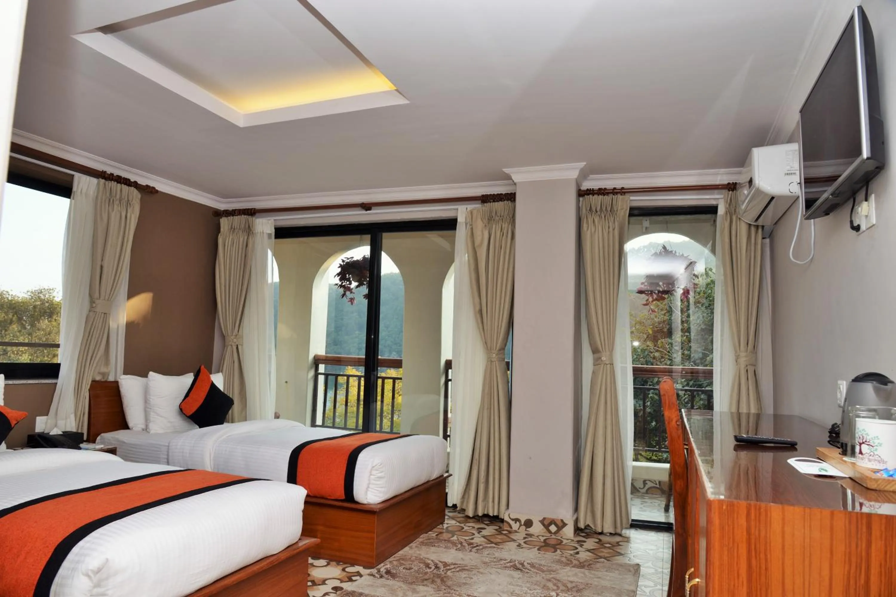 Bed in Hotel Raniban Arcade