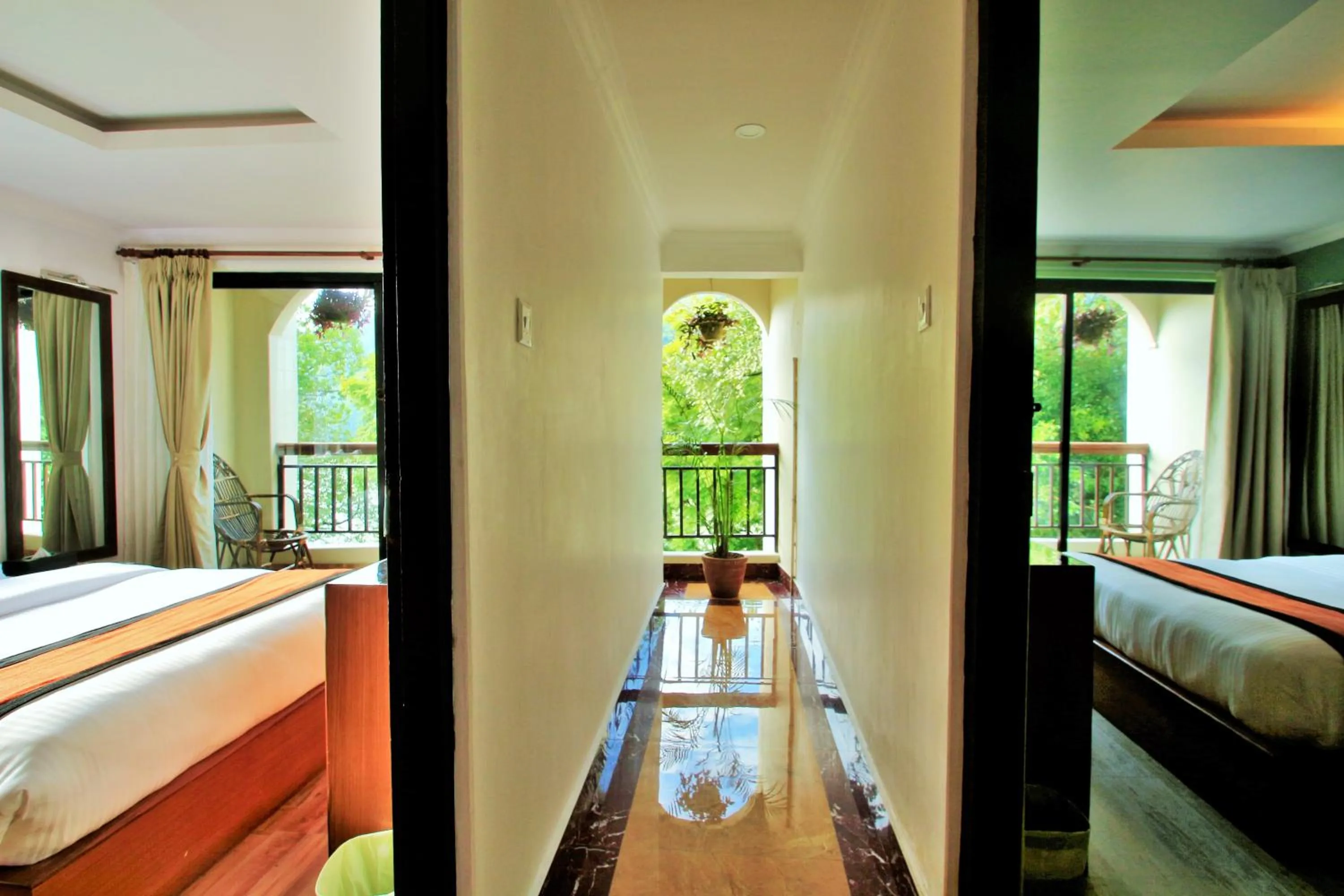 Balcony/Terrace, Bed in Hotel Raniban Arcade