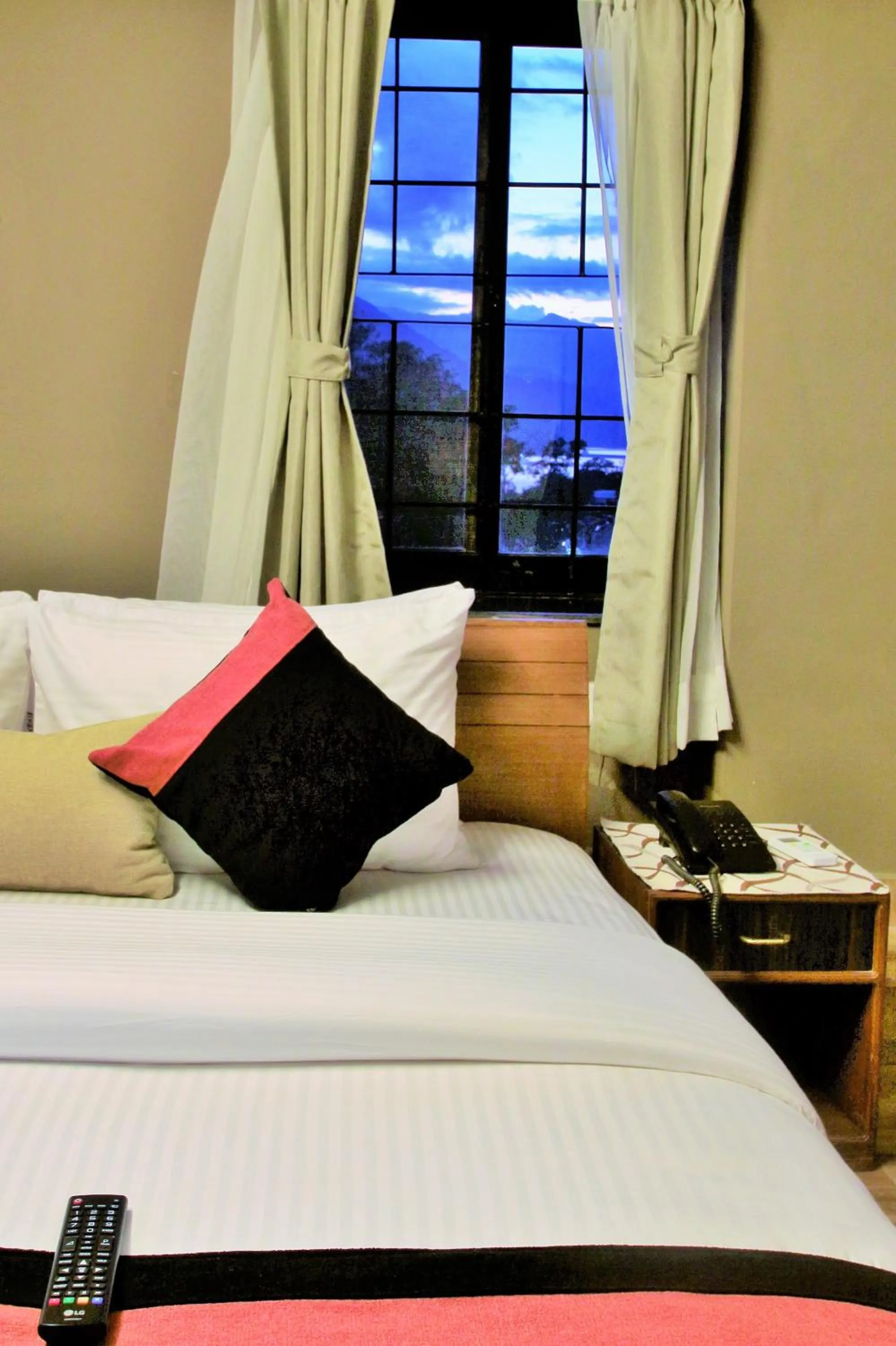 Bed in Hotel Raniban Arcade