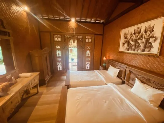 Bed in Sing Sing Resort Lovina