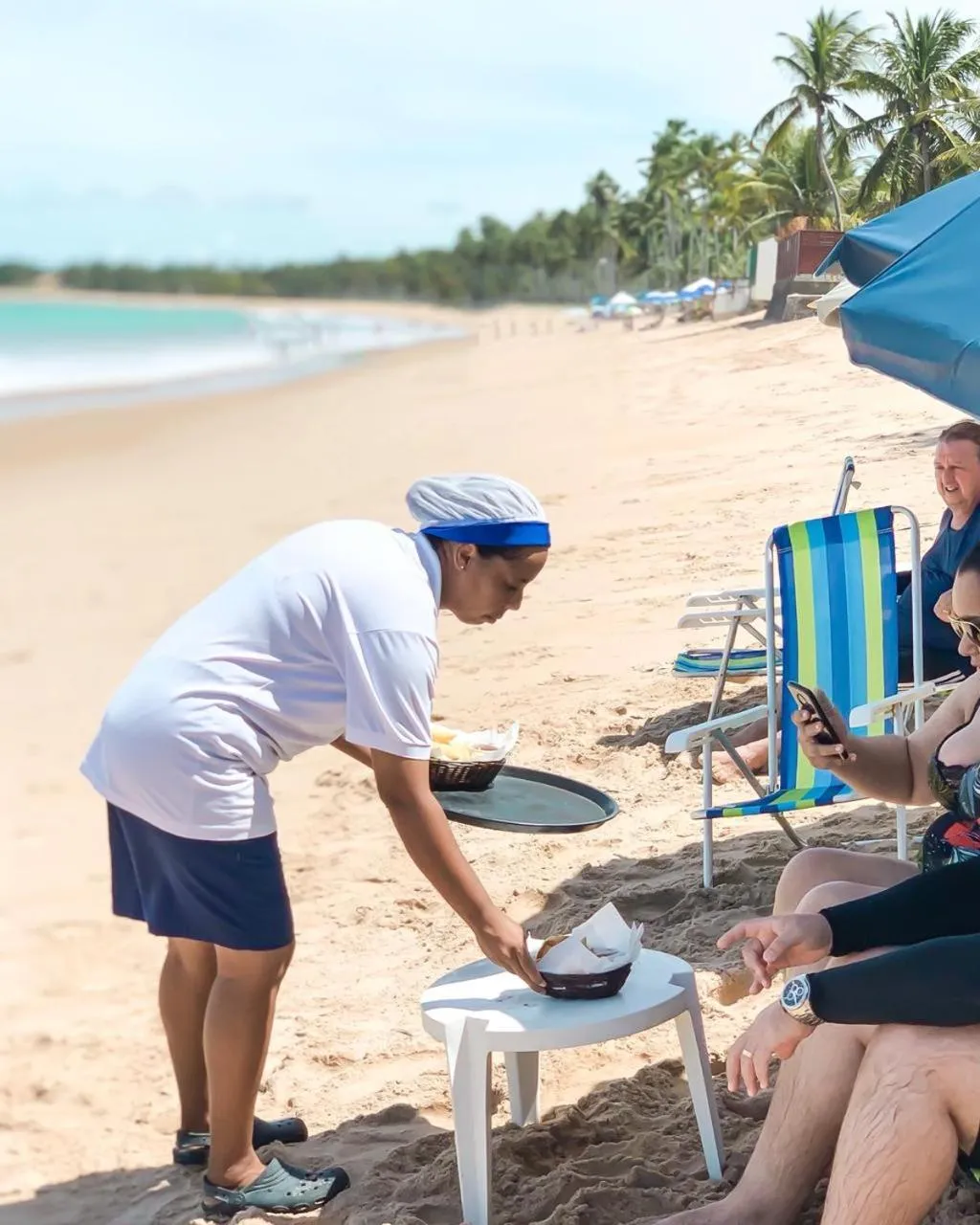 Staff in Wave Suítes Hotel & Lounge bar